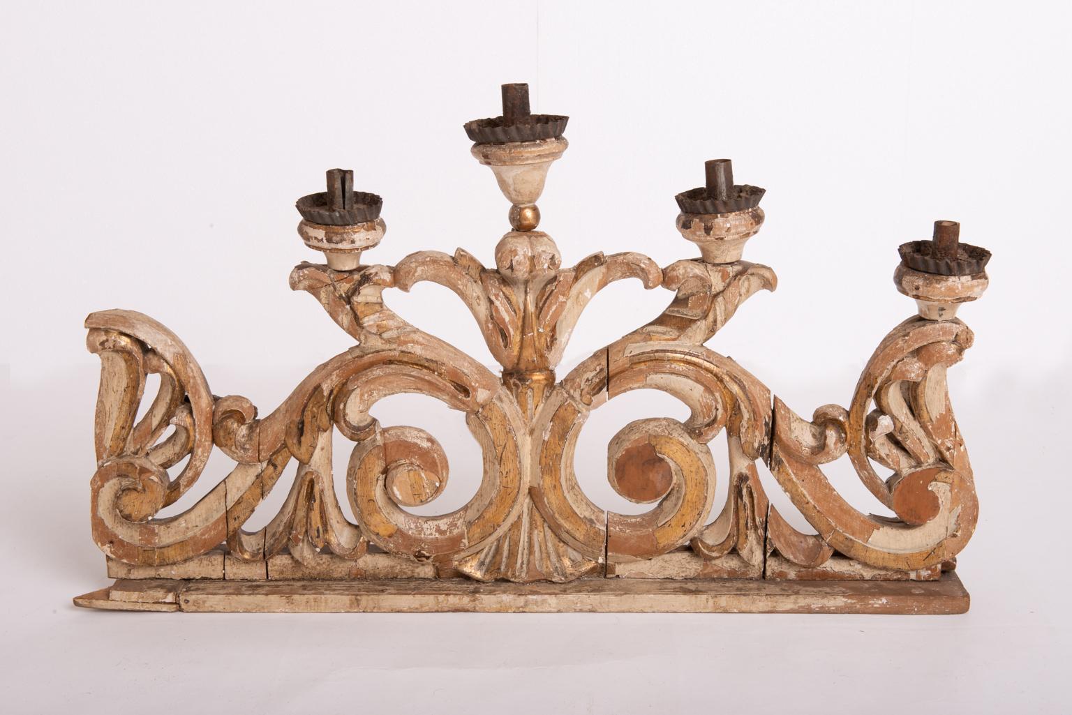 A rare pair of antique large wooden candleholders named 