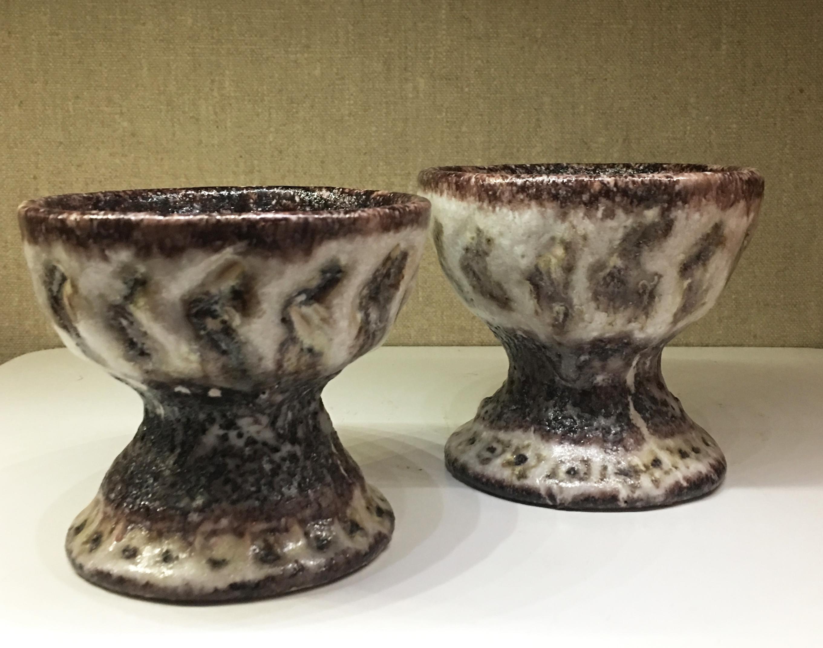 Candle holders by Guidio Gambone with Egyptian Paste Glaze. Ceramic Signed to the bottom of each examples.
4