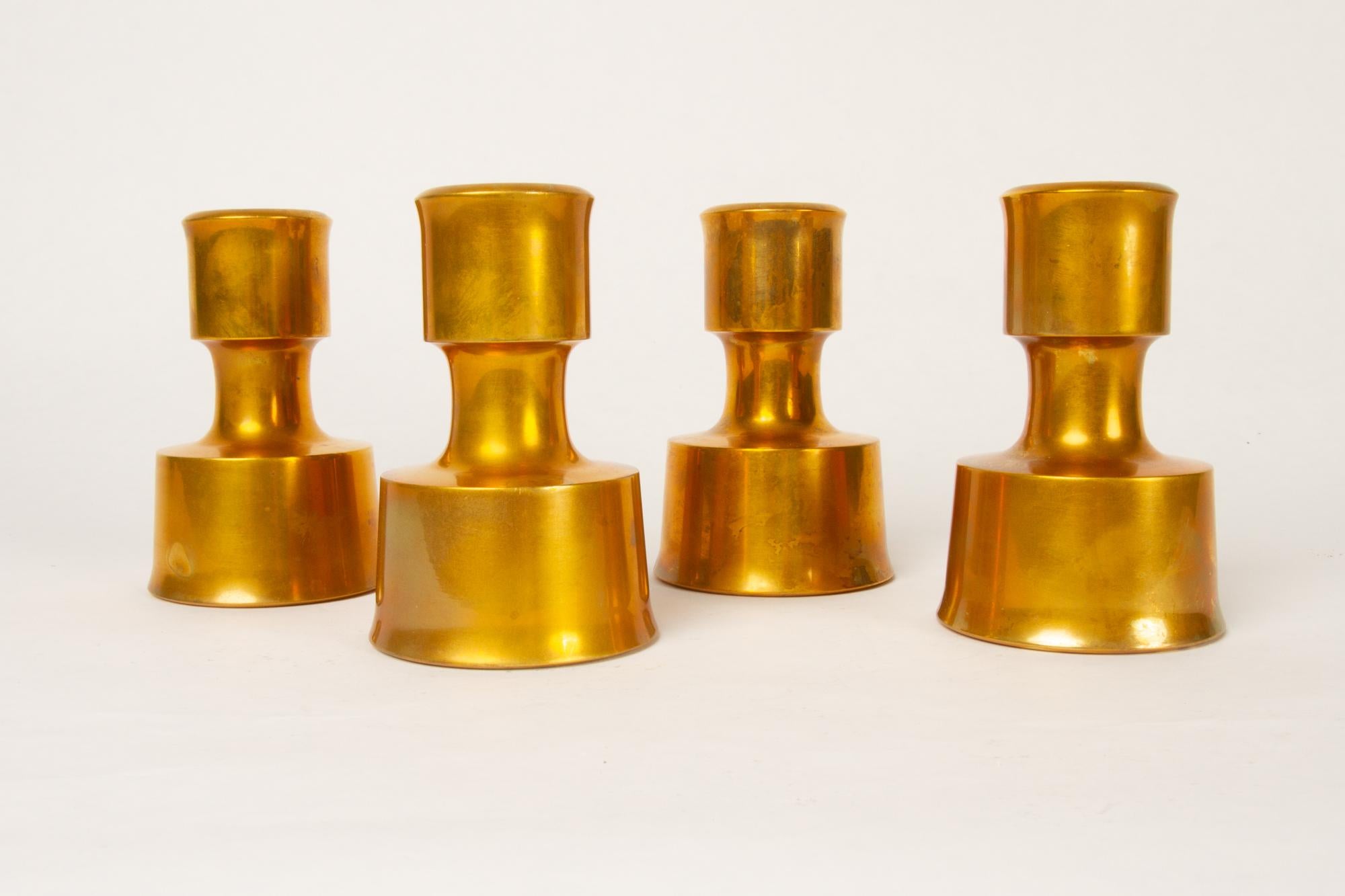 Candleholders by Jens H. Quistgaard for Dansk Designs 1960s set of 4
Set of four vintage brass candleholders designed by Danish designer Jens Harald Quistgaard for Dansk Designs. Beautiful golden patina, with the warm hue of old gold. Cast in solid