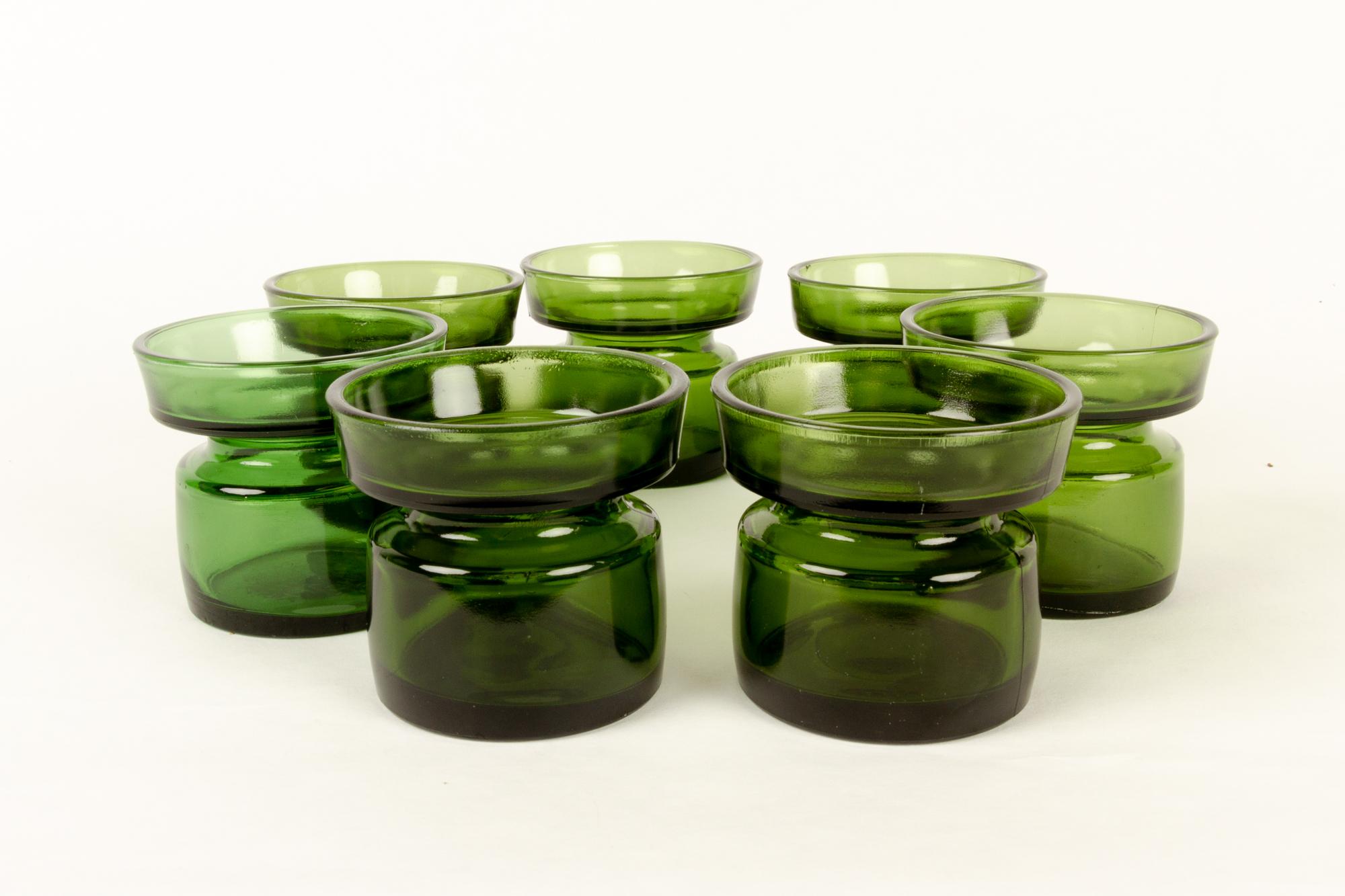 Candleholders by Jens H. Quistgaard for Dansk Designs 1960s set of 7
Set of seven green glass candleholders designed by Danish designer Jens Harald Quistgaard also known as IHQ. Different nuances of green. Makers mark on the bottom: 