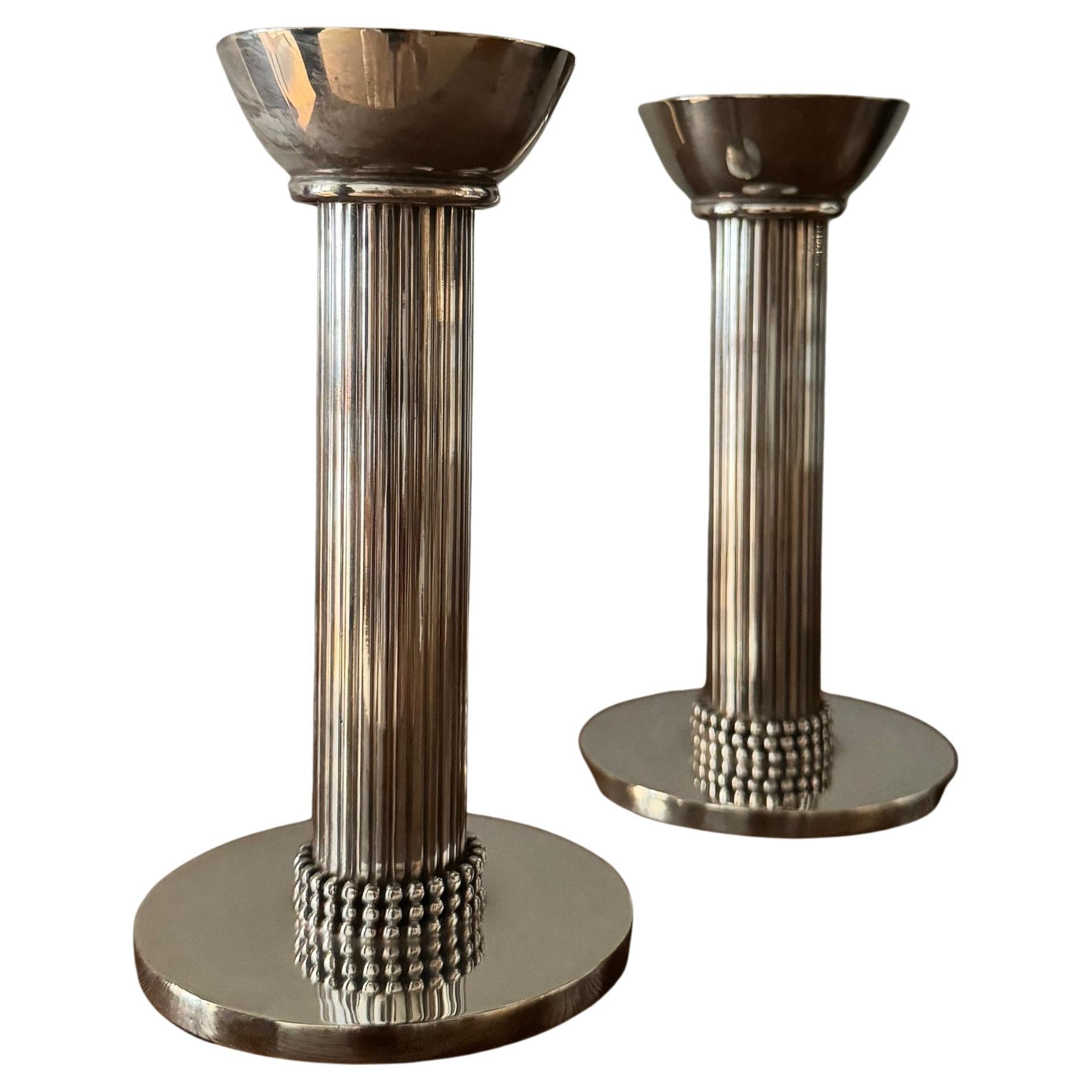 Candleholders Silver-plated bronze signed by Jean Dreprés