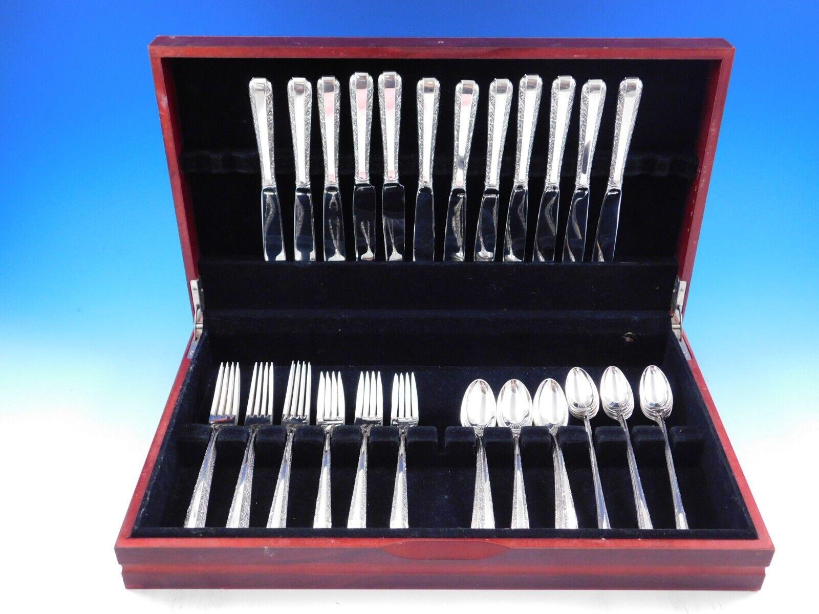 Set di posate in argento sterling Dinner Size Candlelight by Towle, 60 pezzi. Questo set comprende:

12 coltelli per la cena, 9 5/8