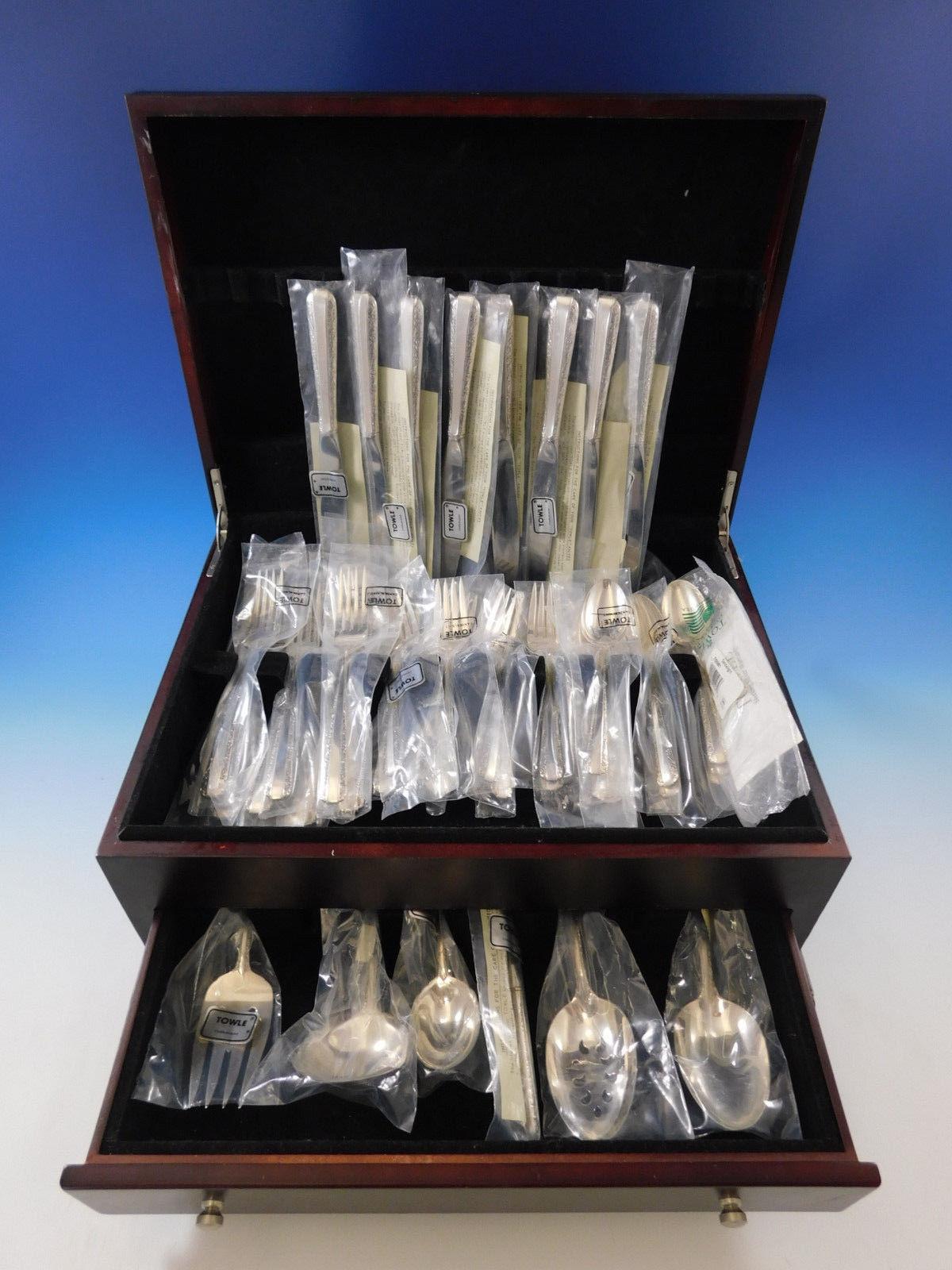 New, unused candlelight by Towle sterling silver flatware set, 38 pieces. This set includes:

8 knives, 8 1/2