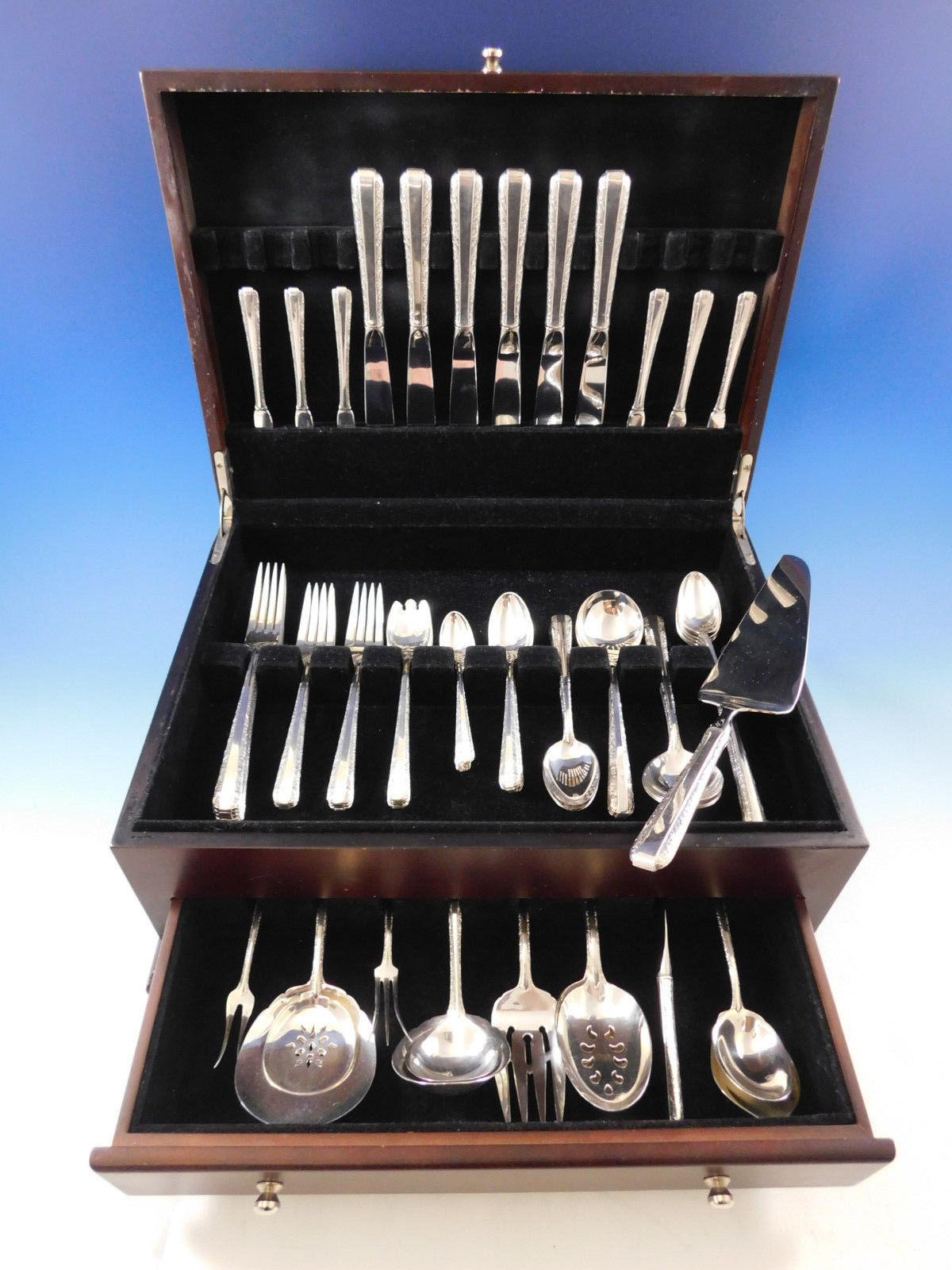 Candlelight by Towle sterling silver flatware set of 73 pieces. Great starter set with lots of wonderful servers! This set includes:

Six knives, 8 5/8