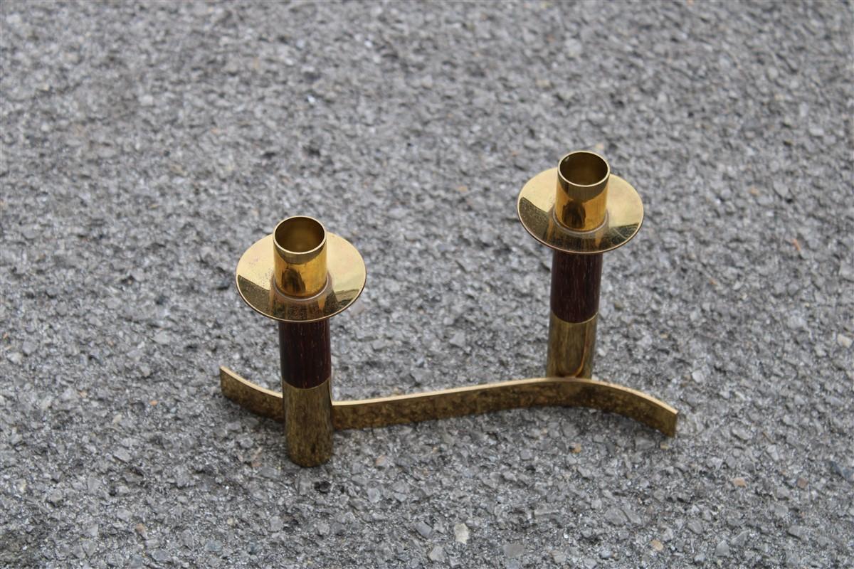 Candlestick articulated midcentury Italian design brass and wood, 1950s.