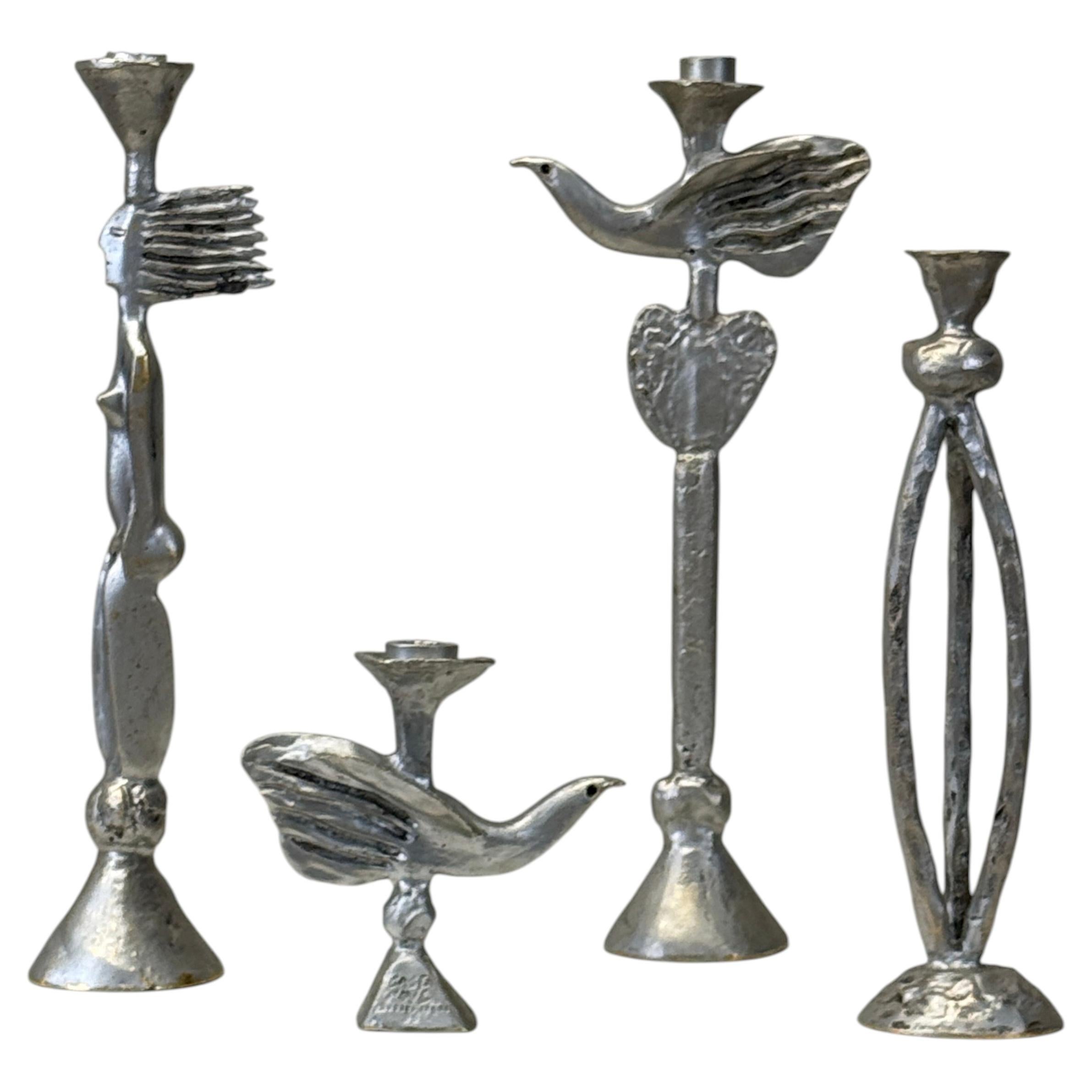 Conjunto de candelabros de bronce plateado, de Pierre Casenove en venta