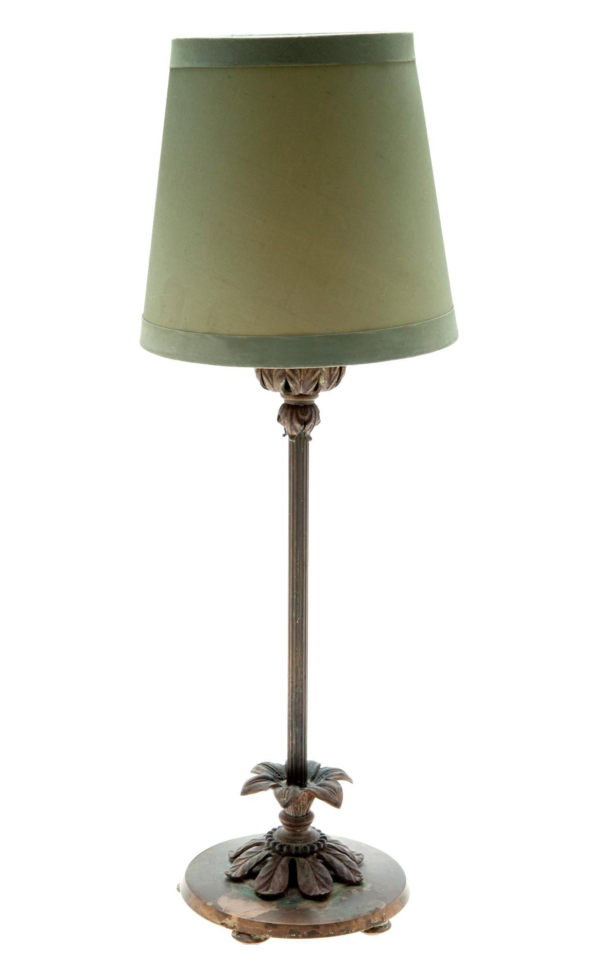 Petite boudoir lamp, circa 1930's. Reeded tubing, original on off switch. Raised on 4 flat feet. Rewired.
Shade Size:
6