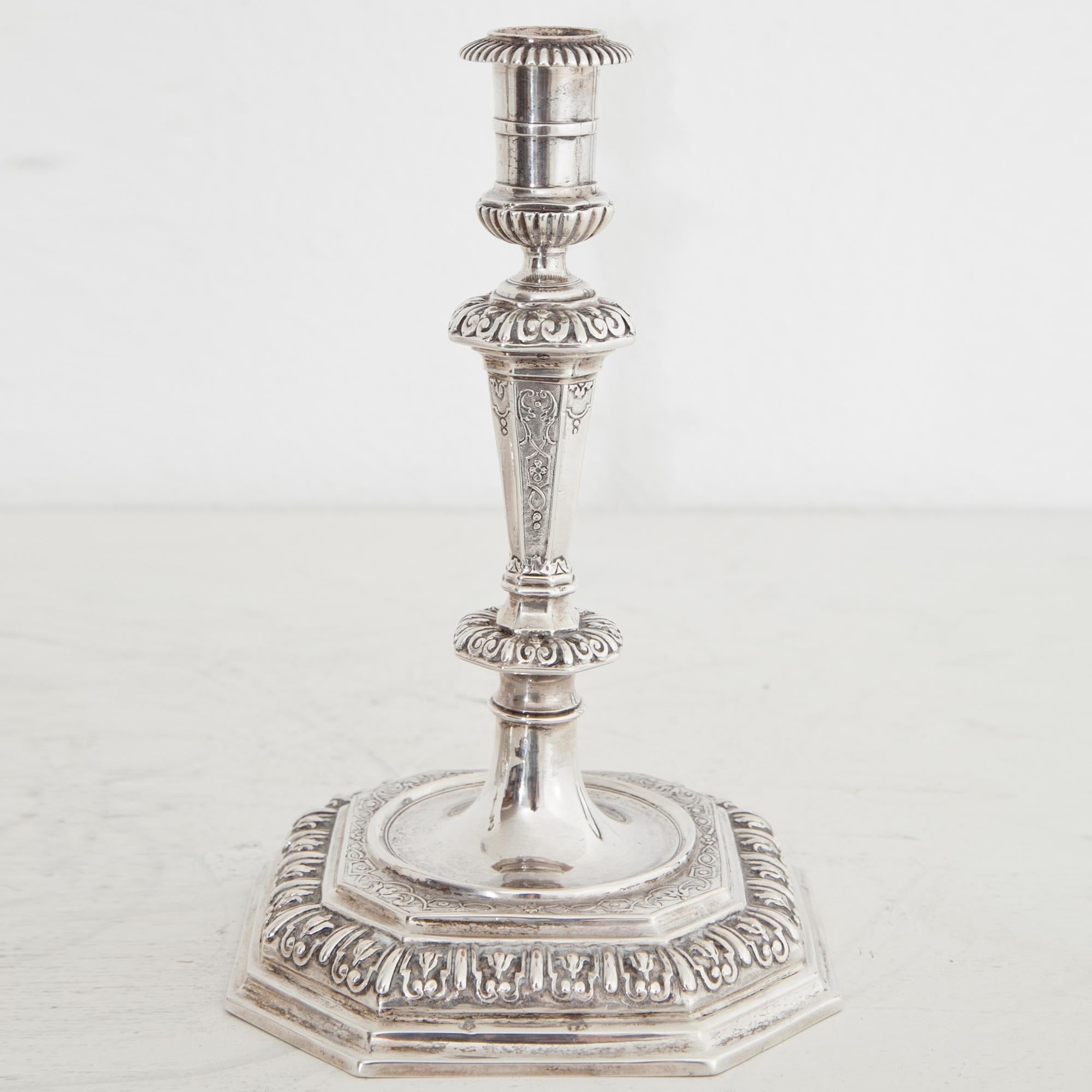 Pair of silver candlesticks by Peter Kick (born 1672, Master circa 1700, died 1721). Ex Collection Heidi Hübner, Würzburg. Pair of Candlesticks from one of the “most important Augsburg goldsmiths” (I, 147), Peter Kick (III, 291-2, 1942), „decorated