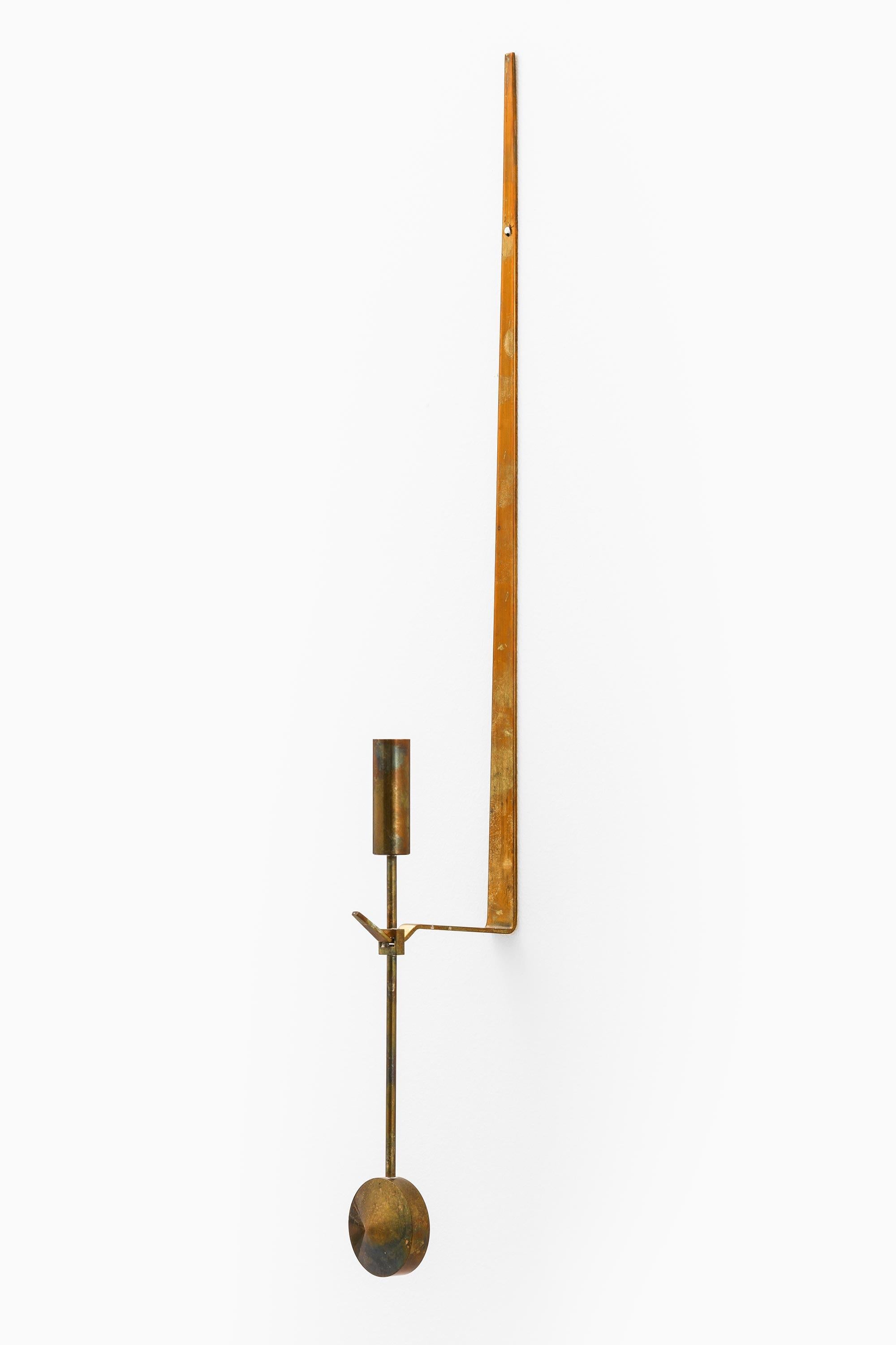 Candlesticks in Brass by Pierre Forssell for Skultuna, 1950s

Additional Information:
Material: Brass
Style: Mid Century, Scandinavian
Candlesticks
Produced by Skultuna in Sweden
Dimensions: 
(W x D x H): 4 x 8 x 48 cm