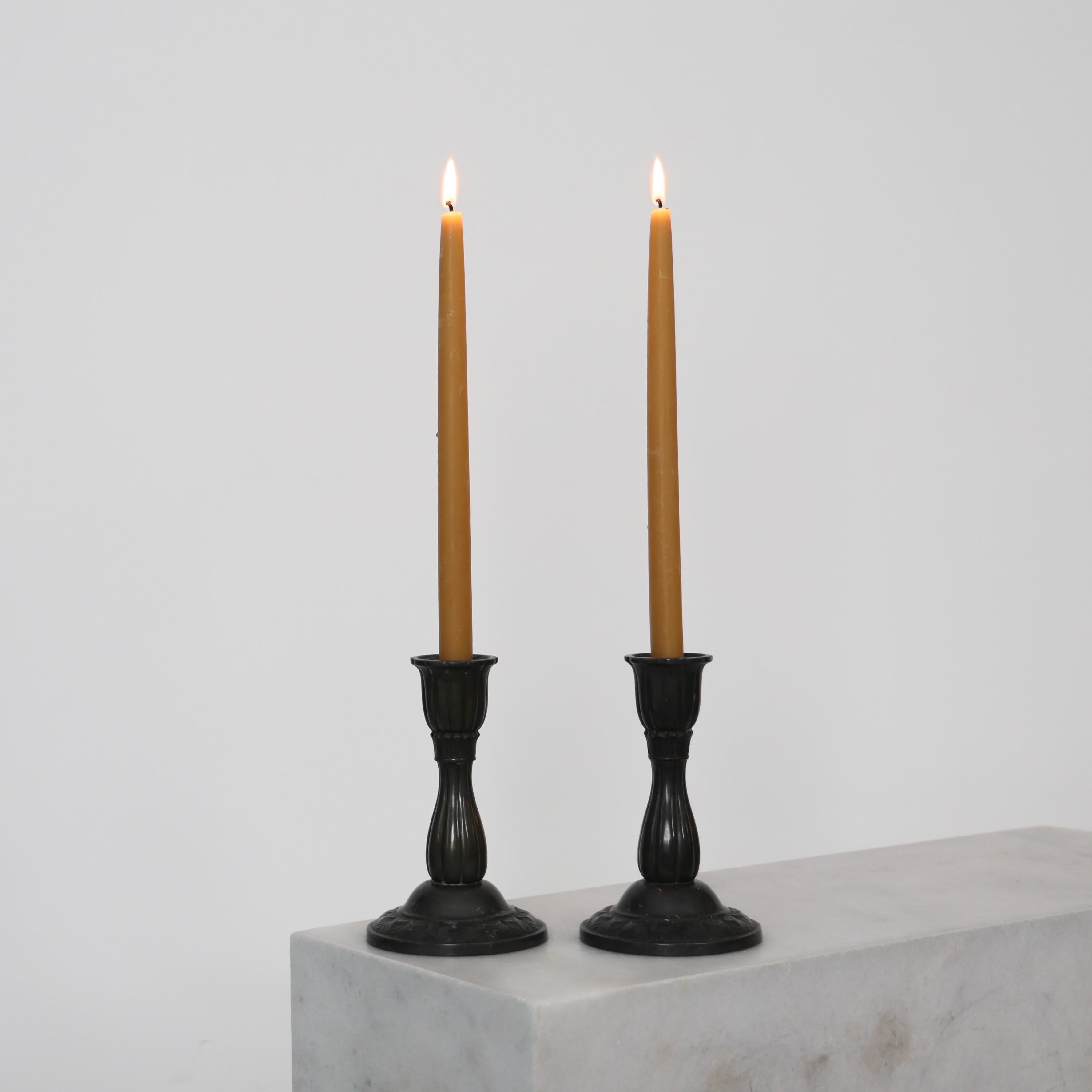 Set of Art Deco Diskometal Candlestick Holders designed by Just Andersen in 1920s. Part of Andersen's earlier work. An exquisite set for a beautiful place.

* Set of diskometal candlestick holders
* Designer: Just Andersen
* Manufacturer: Just