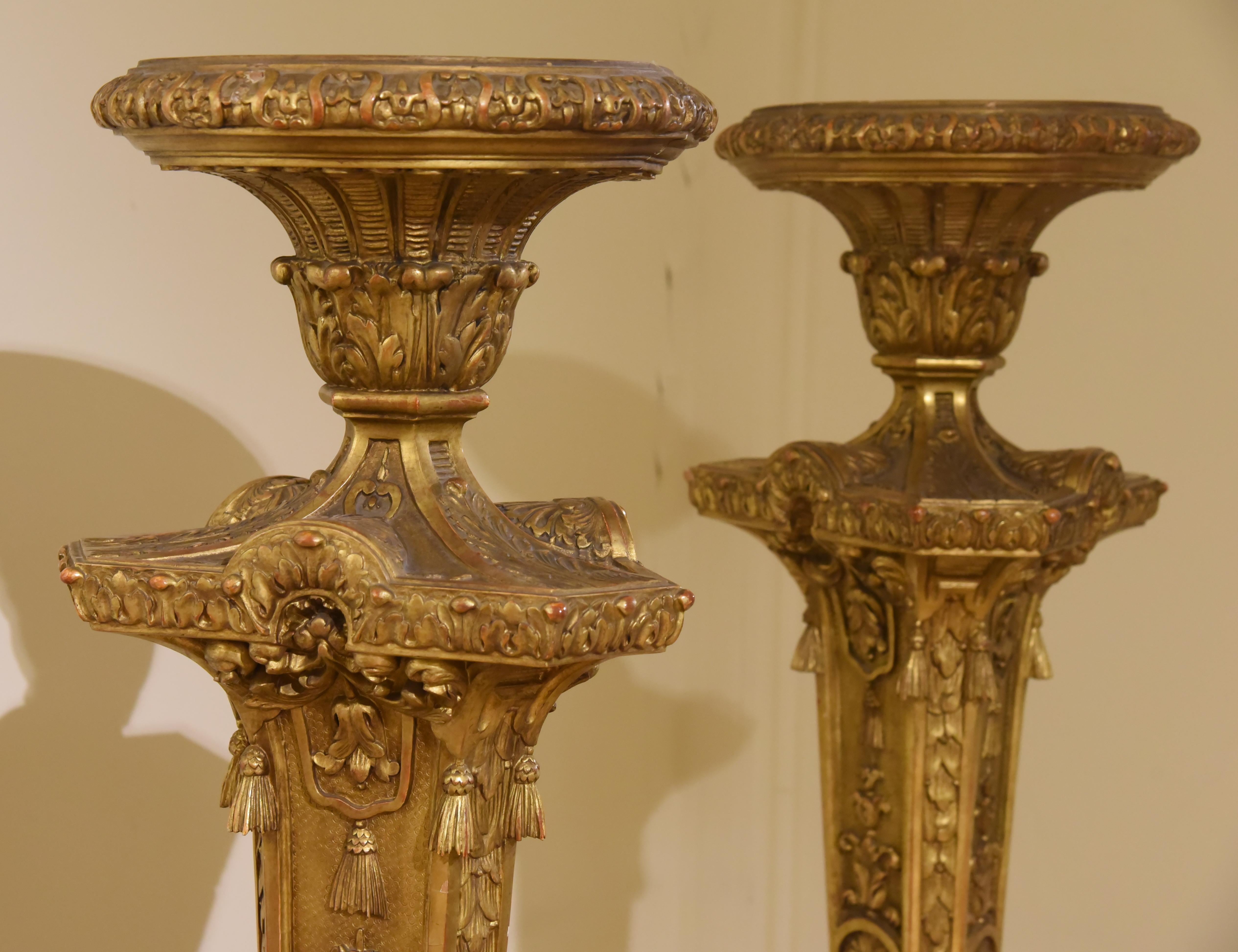 Pair of 19th Century Candlesticks, Napoleon III style, Hand Carved, Gilding in pure Gold Leaf, made in the late 1800s, French origin.