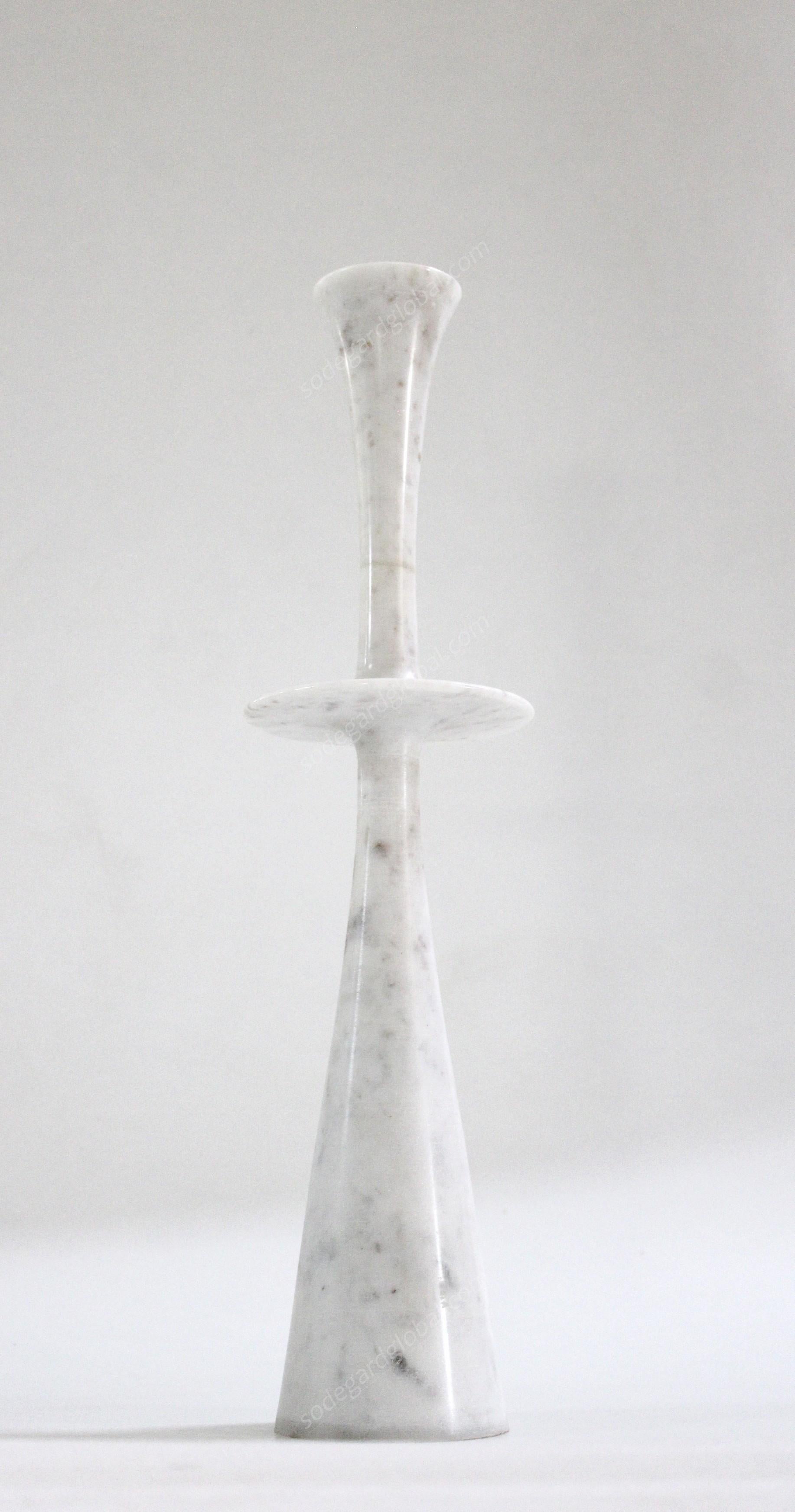 Paul Mathieu designed these elegant candlesticks for Stephanie Odegard Co. Ltd. Solid pieces of marble are turned to create these delicate designs namely Ove, Flute, Plat I and Plat II.

Candlesticks Plate i
Size-  6” x 6” x 23” H.
Materials - White