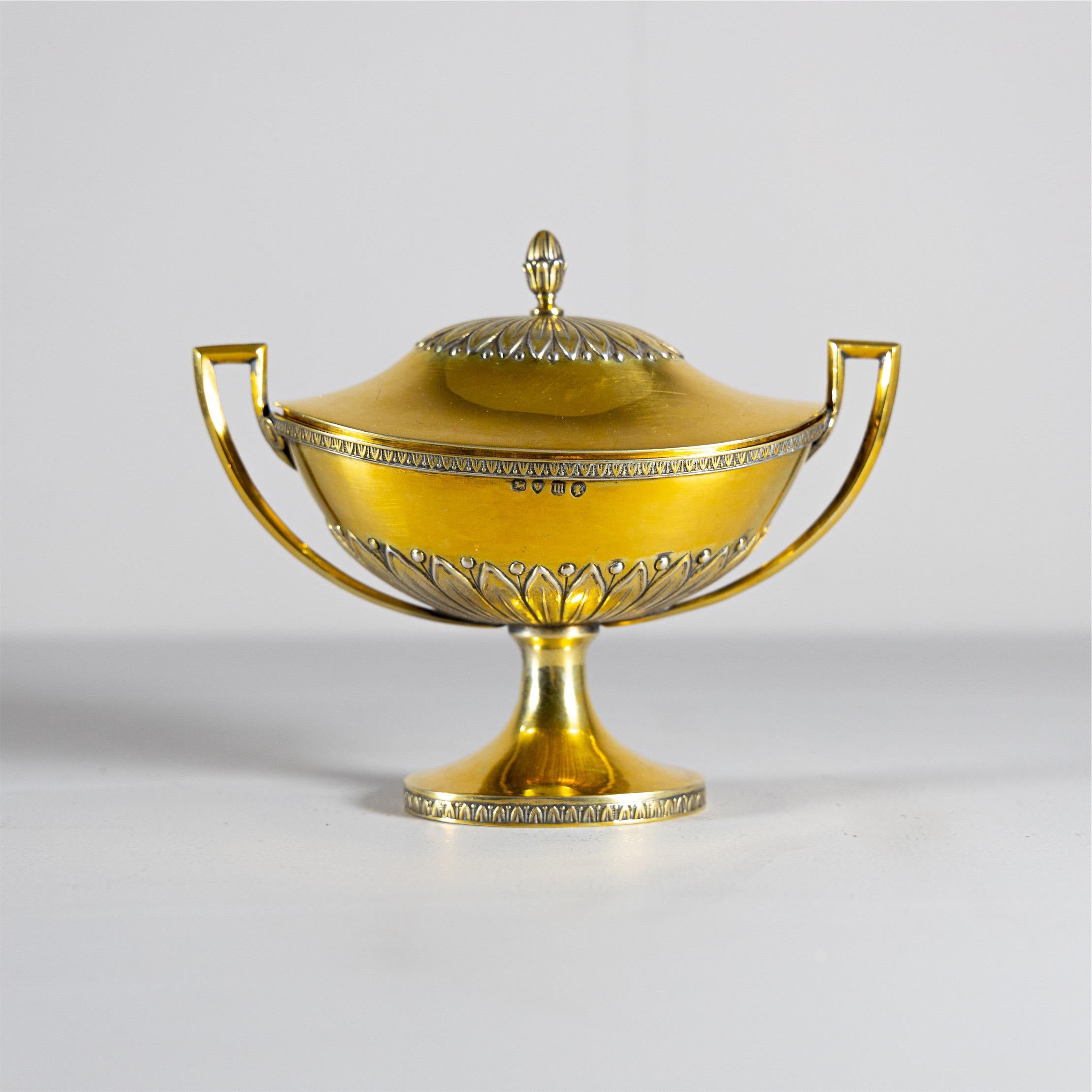 Small vermeille candy bowl with side handles and antiqued decoration. Hallmarked on the side London 1867.