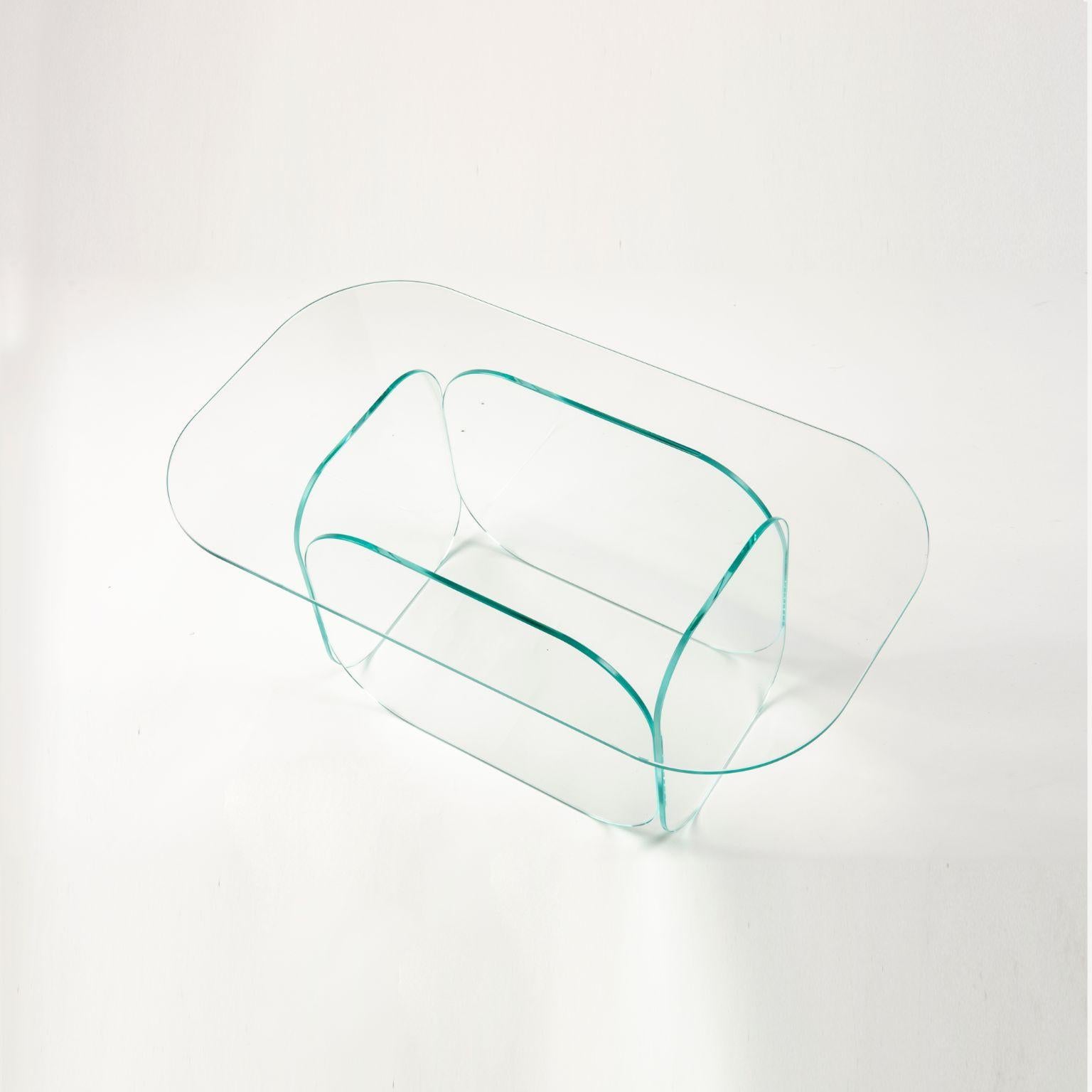 Candy clear glass coffee table sculpted by Studio-Chacha
Dimensions: 45 x 80 x 40 cm
Materials: Clear glass 

Studio-Chacha is a high-end art furniture studio founded in 2017 that creates a new aesthetic with an unfamiliar combination of