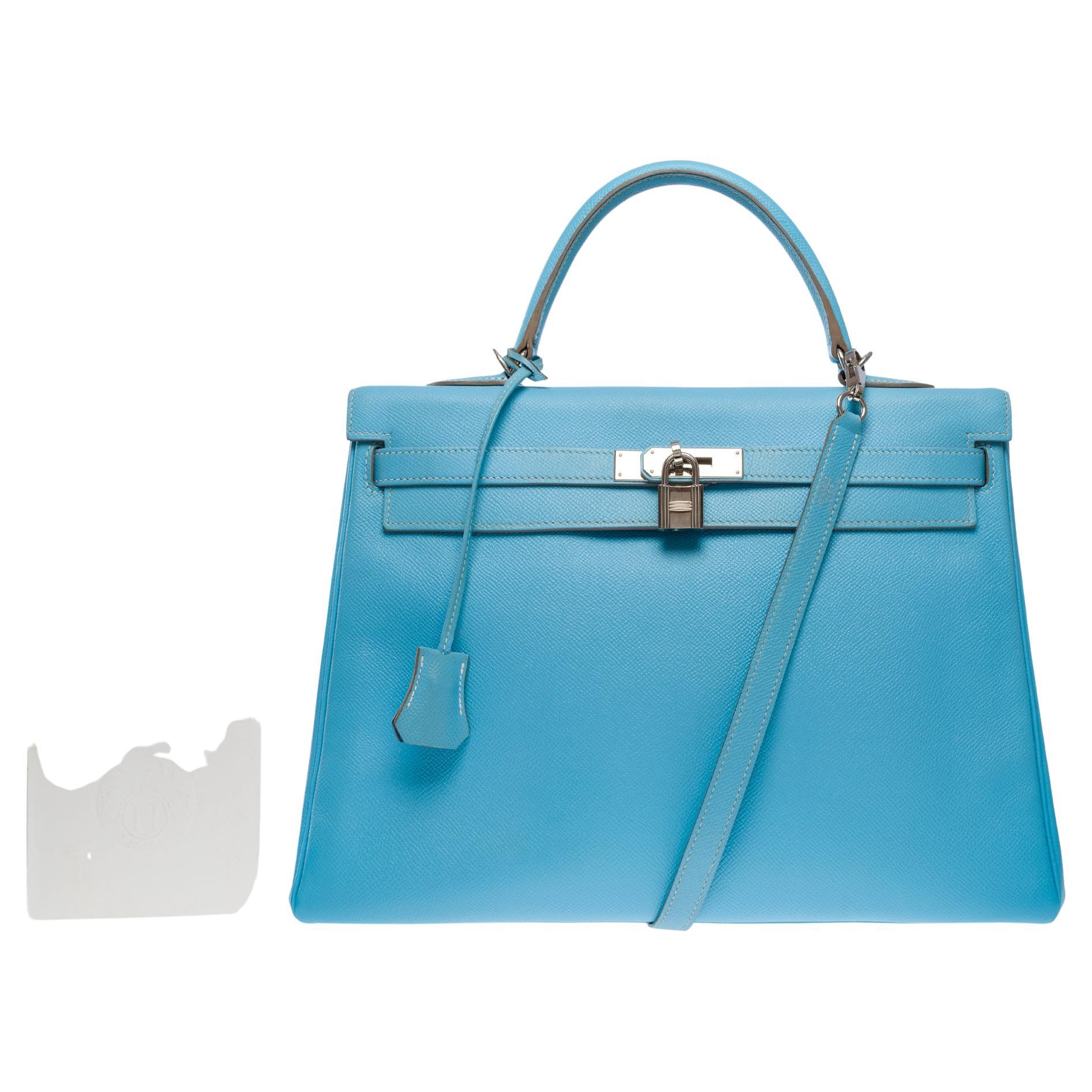 Magnificent & Rare Hermes Kelly 35 retourne  from the Candy limited edition Collection in Blue Celeste Epsom leather with white stitching and Mykonos blue leather interior, palladium silver metal hardware, double blue leather handle for hand or