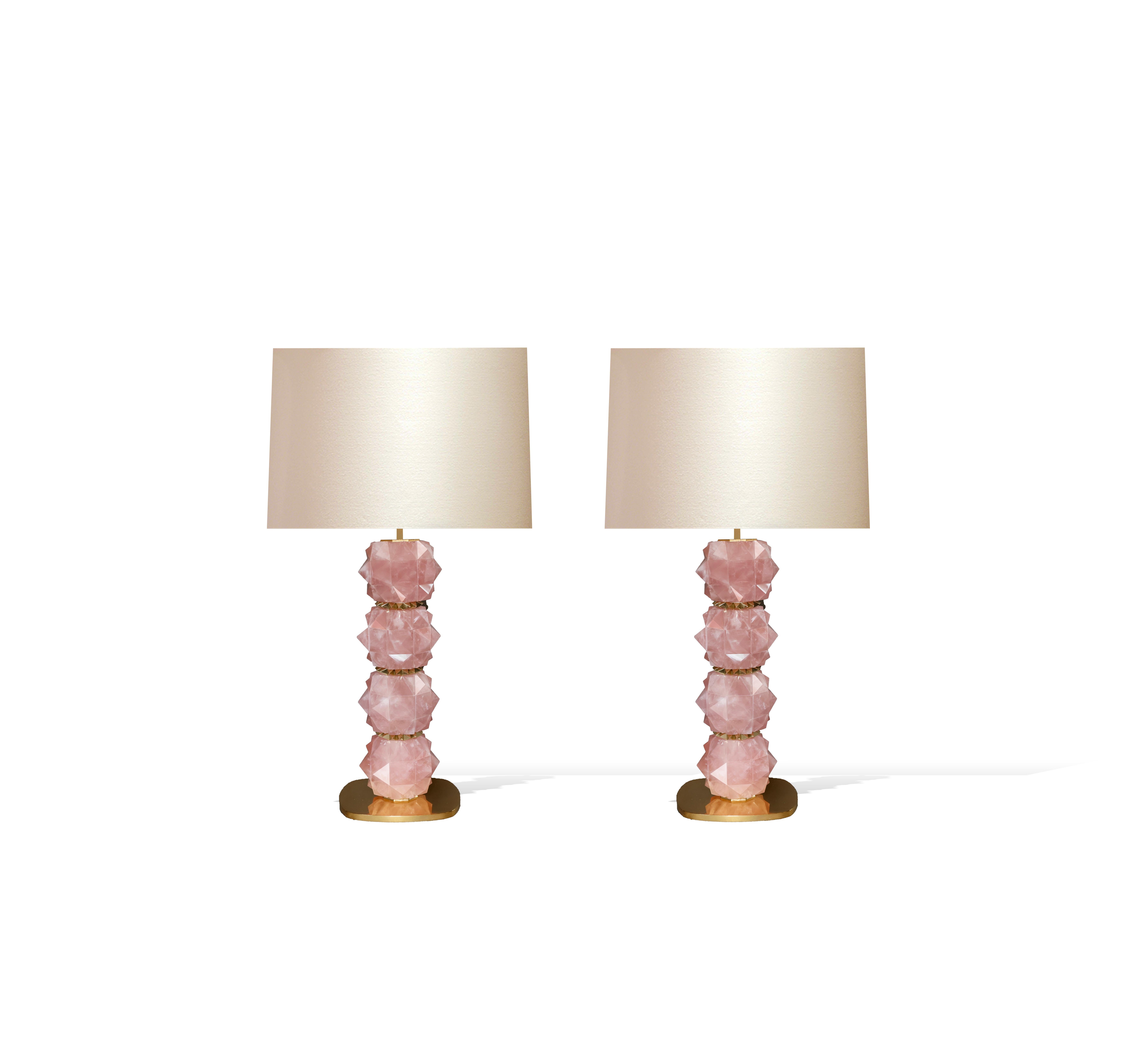pair of multi faceted pink rock crystal candy lamps with polished brass decorations, created by Phoenix gallery.
Lampshade not included.
To the top of the rock crystal 16 inch.
    