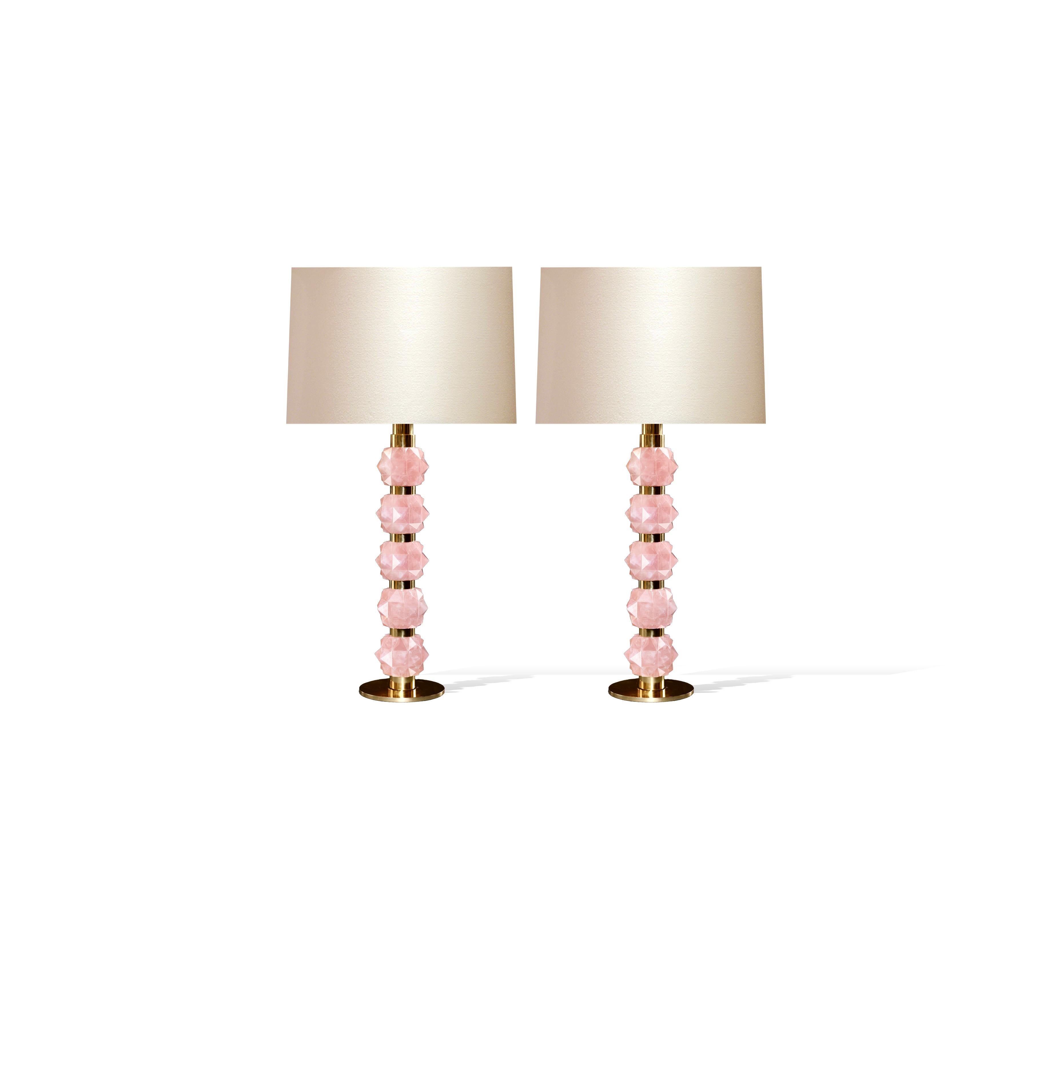 Pair of multi faceted pink rock crystal quartz lamps with polished brass decorations, created by Phoenix gallery.
Lampshades not included.
To the top of the rock crystal 23 inch.