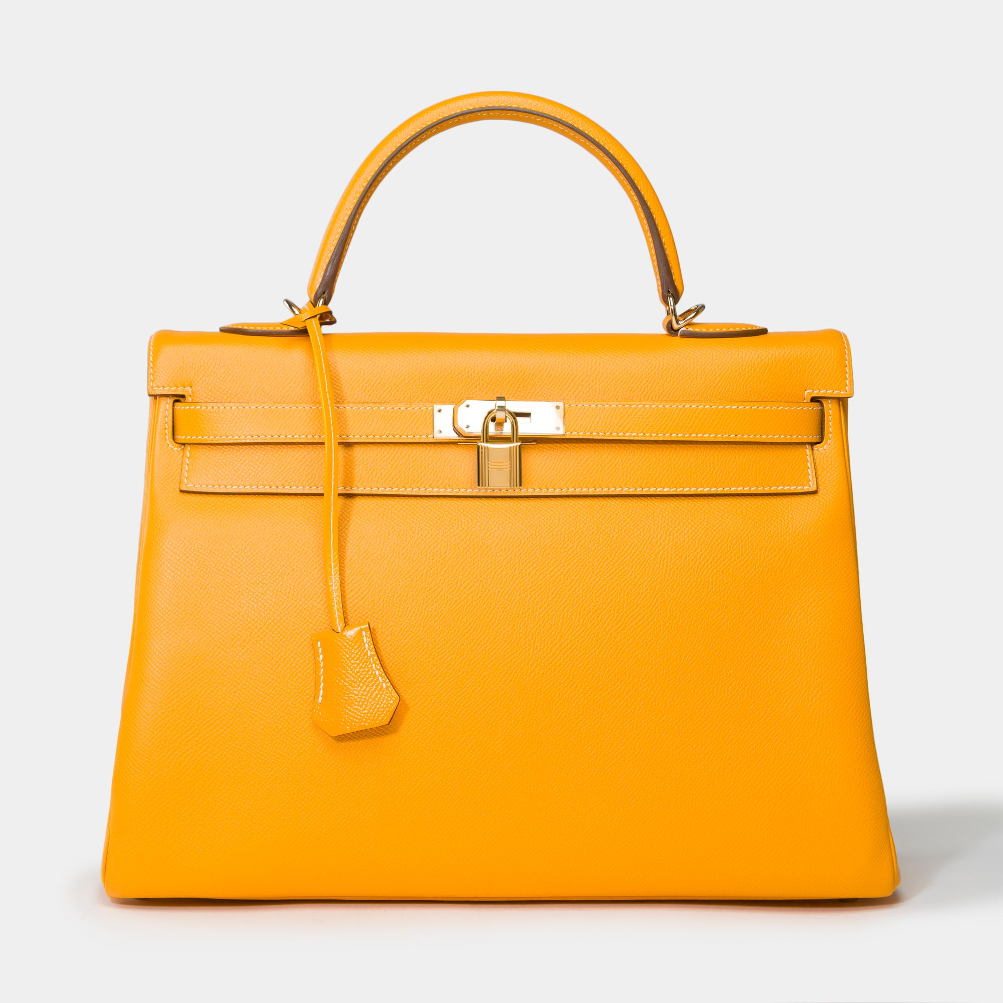Gorgeous​ ​&​ ​Rare​ ​Hermes​ ​Kelly​ ​35​ ​retourne​ ​handbag​ ​strap​ ​limited​ ​edition​ ​from​ ​the​ ​Candy​ ​Collection​ ​in​ ​Epsom​ ​Yellow​ ​Jaune​ ​d'Or​ ​leather​ ​with​ ​white​ ​wtitching​ ​and​ ​pumpkin​ ​leather​ ​Interior,​ ​​ ​​