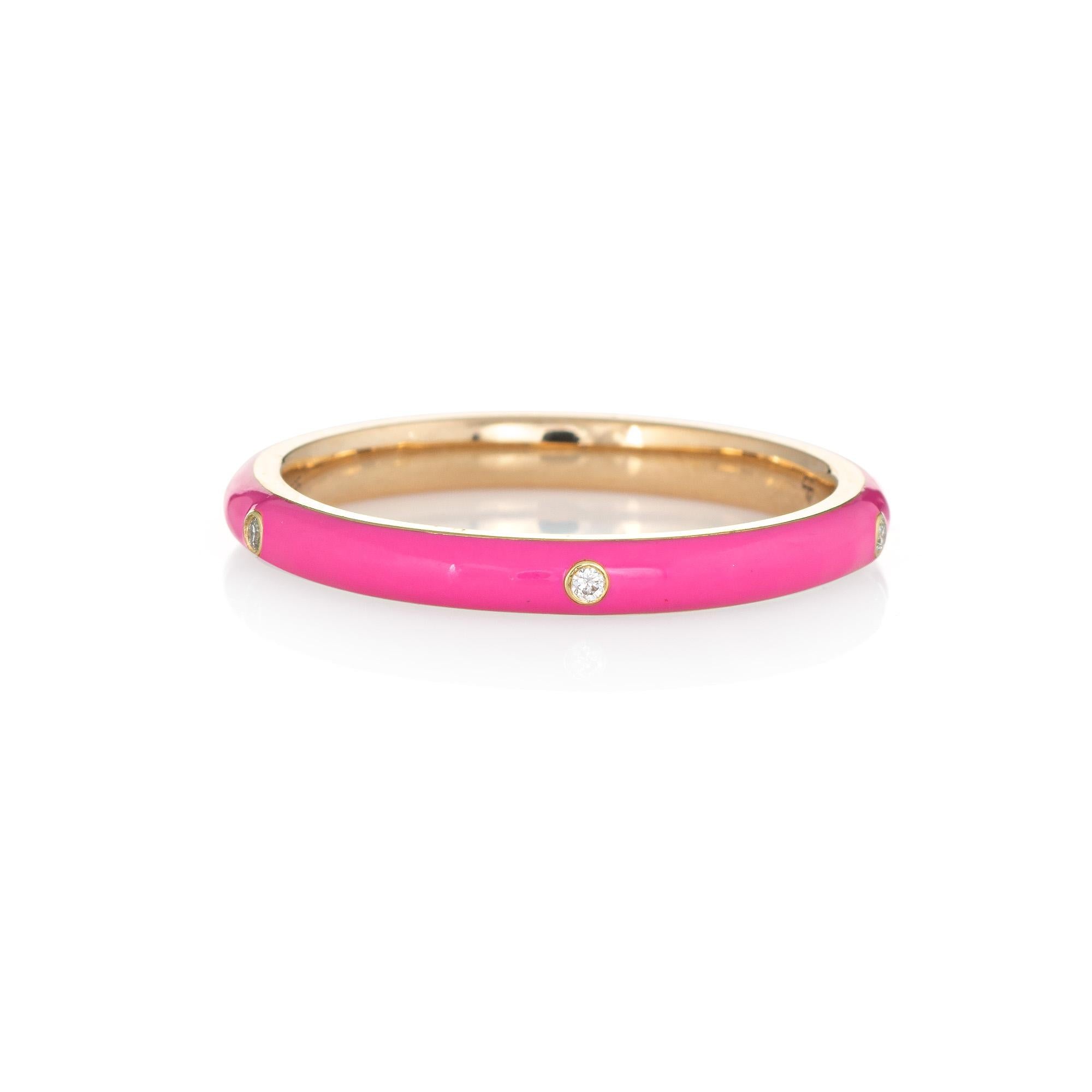 Stylish candy pink enamel & diamond stacking band crafted in 14 karat yellow gold. 

5 round brilliant cut diamonds total an estimated 0.03 carats (estimated at H-I color and SI2-I1 clarity). 

The enameled band is a striking candy pink color with 5