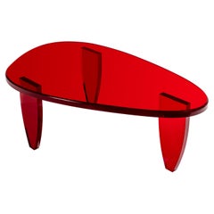 Table basse rouge bonbon par Charly Bounan