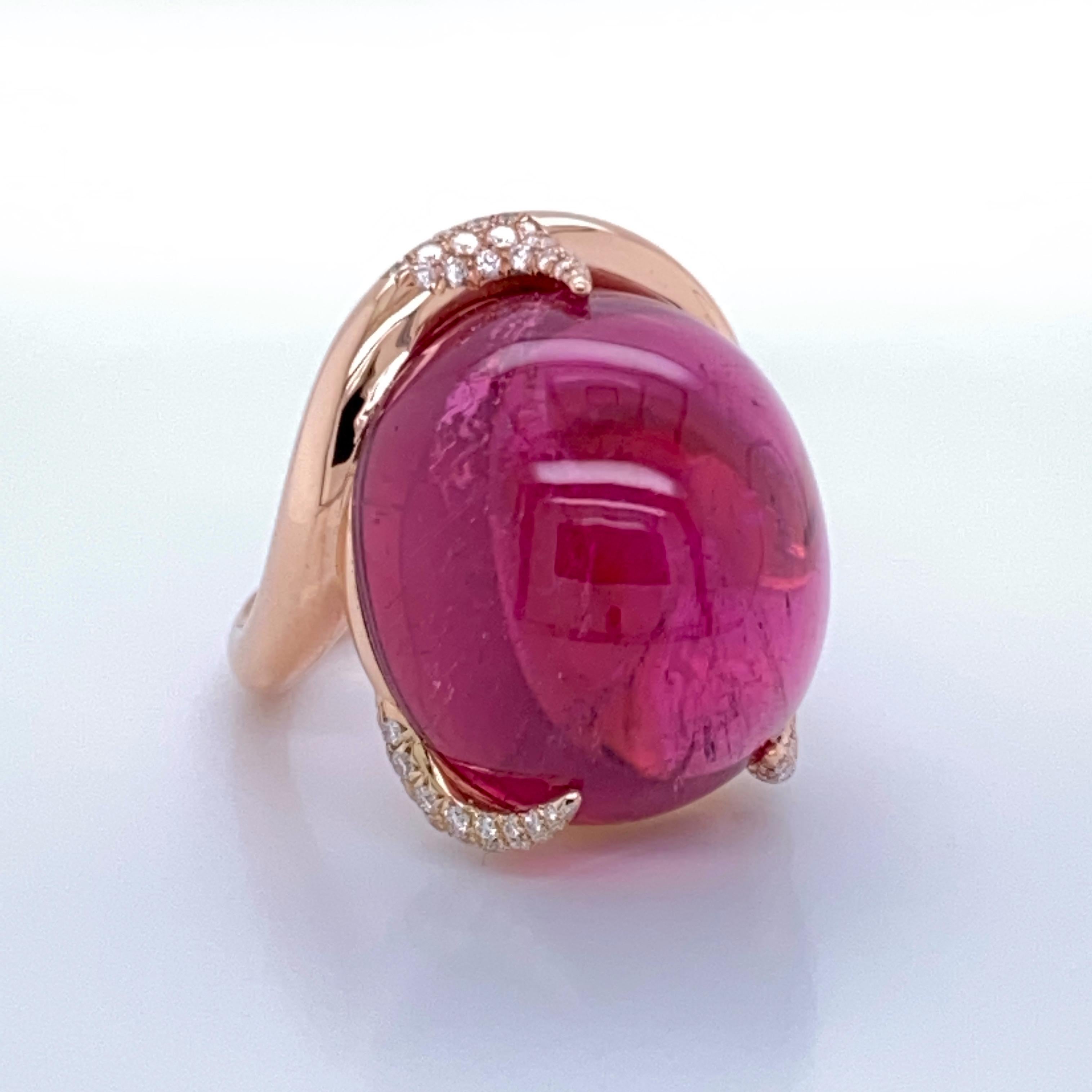 18K Gold Pink Tourmaline cabochon 47.72 Cts Ring

Ring gold 18K  15,78 gr
0,42 Cts Diamonds brilliant cut 
Pink Tourmaline cabochon 47,72 Cts
Size 54

This stunning pink tourmaline ring is a real eye-catcher and is perfect to be worn on any