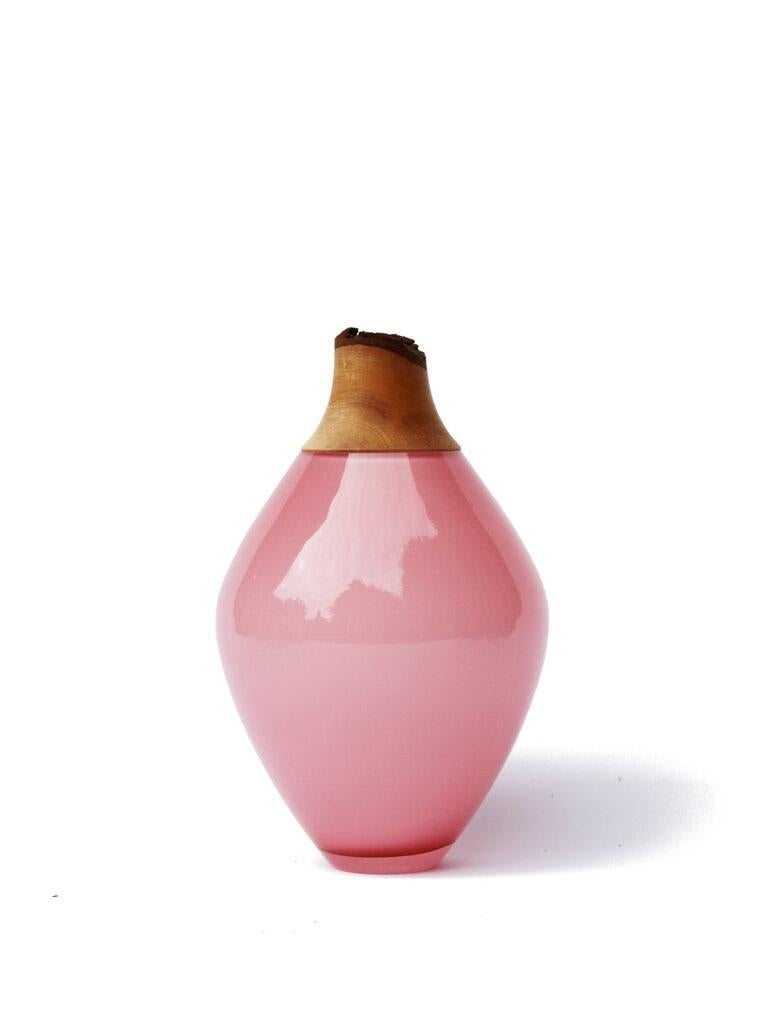 Candy rose Matisse stacking vessel III, Pia Wüstenberg
Dimensions: D 11 x H 21
Materials: glass, wood
Available in other colors.

The Matisse Stacking Vessels are treasures, small splashes of curvy glass with a wooden crown. The collection was