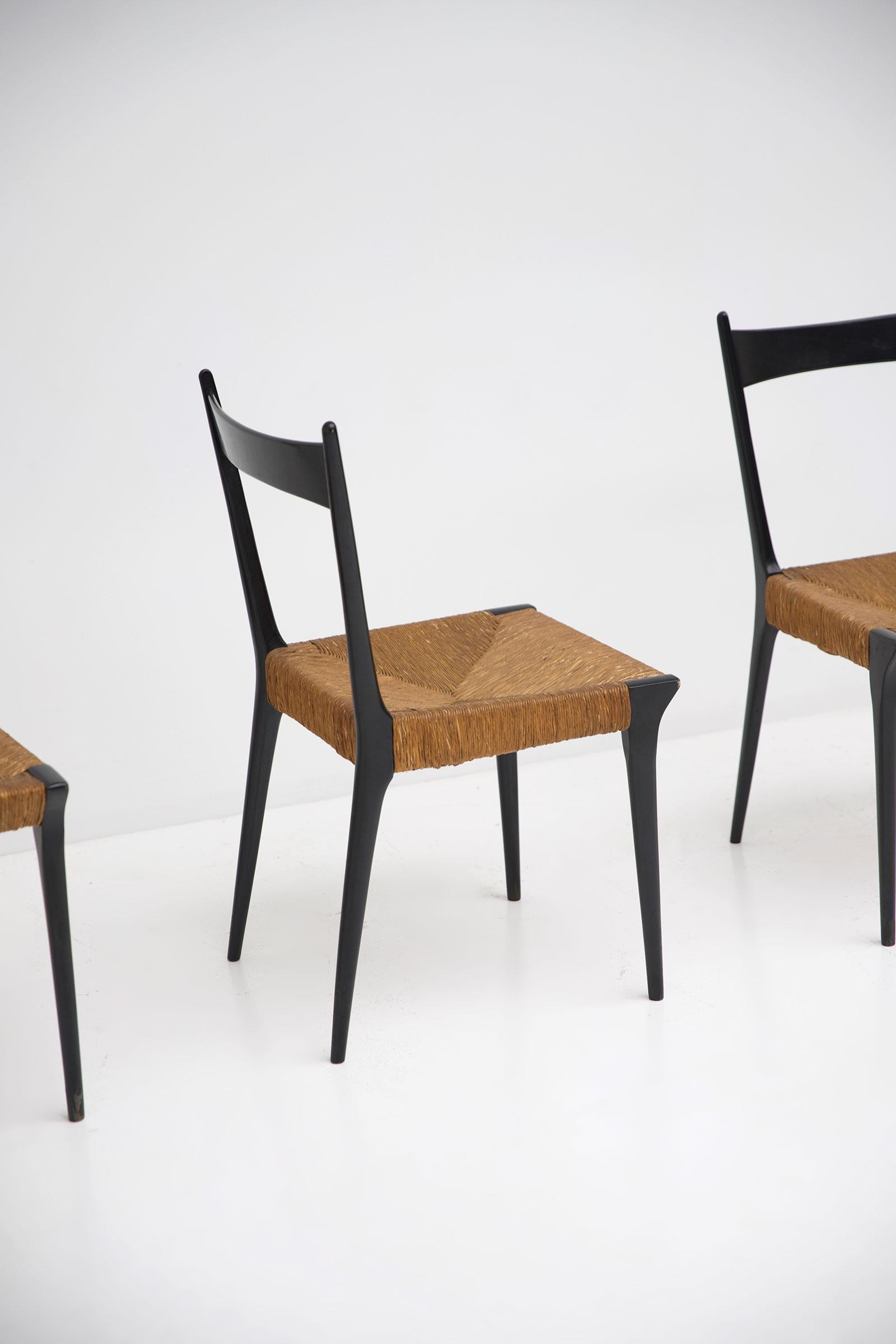 Mid-Century Modern, set of six 'S2' chairs designed by Alfred Hendrickx in 1958 for Belform.
The chairs are made of black lacquered cherry wood and have woven cane seats. The elegant black frame with the cane seat is a nice example of sophisticated