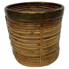 Basurero de caña y latón