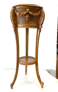 Cane and Carved Wood Plant Stand with Craved Drape Decoration