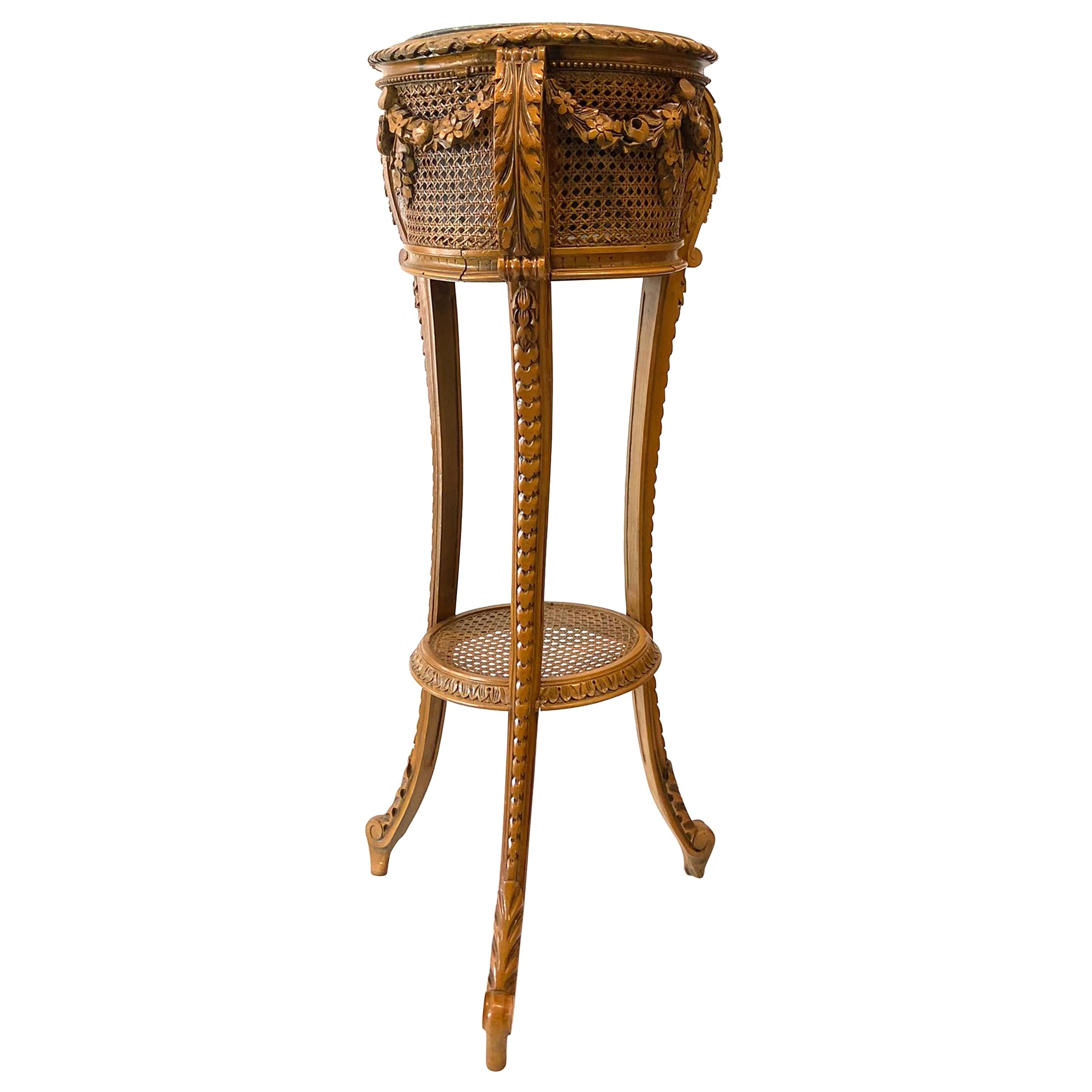 Cane and Carved Wood Plant Stand with Craved Drape Decoration