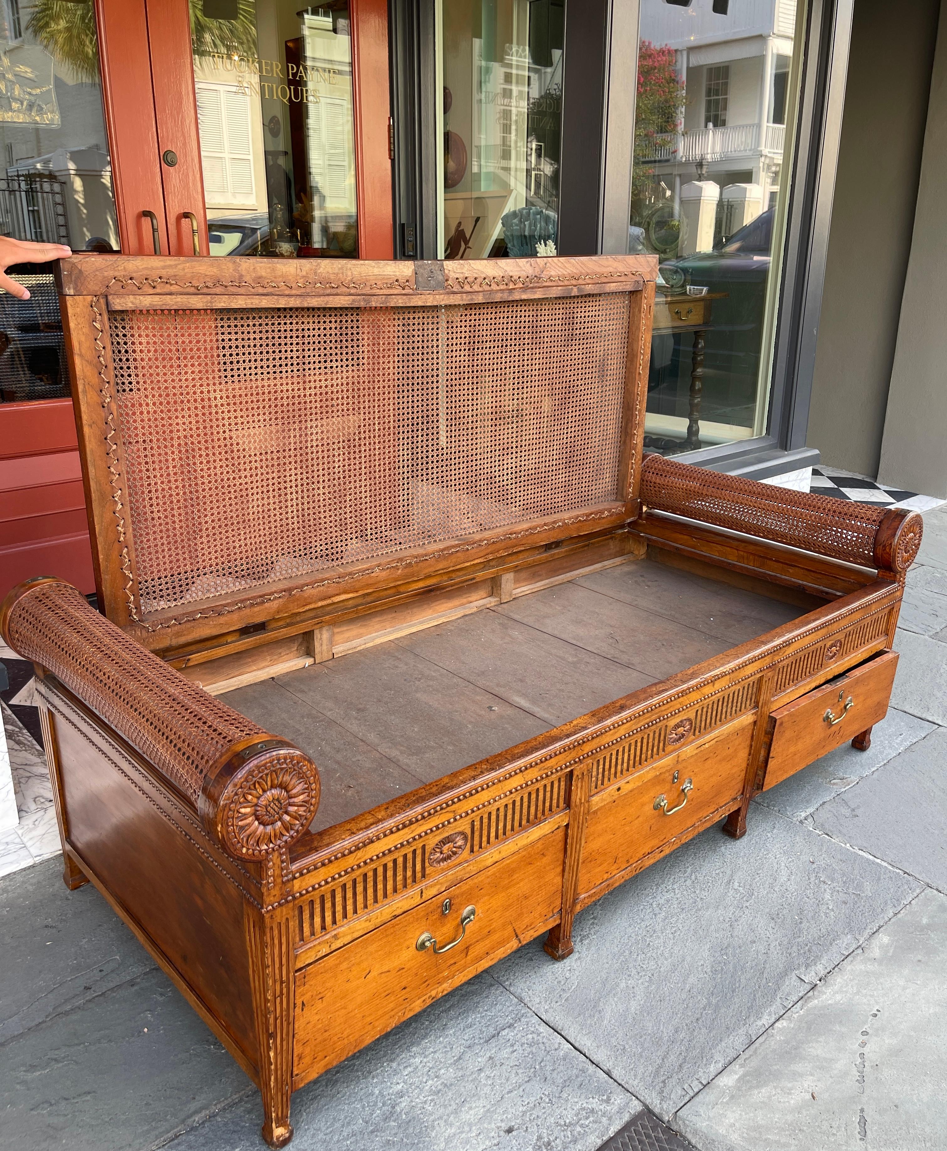 Mahogany Cane and hardwood China Trade day bed with rolled arms c.1820 For Sale