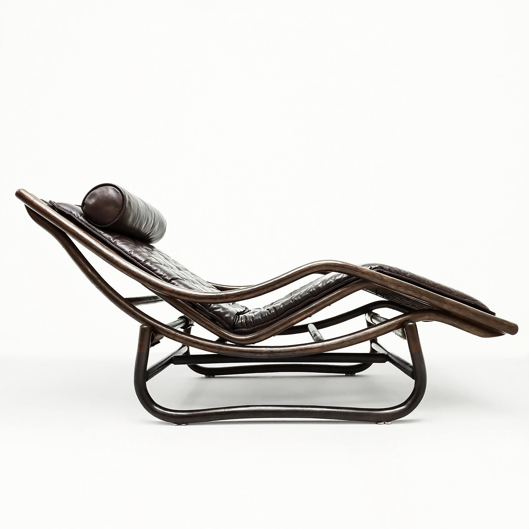 A very rare and unusual cane and chocolate brown leather chaise longue attributed to Dutch manufacturer Rohe Noordwolde. 

This design utilizes the same concept as Corbusier’s famous LC4 chaise of using a simple curved frame set on a sled base. This