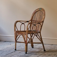 Cane and rattan armchair