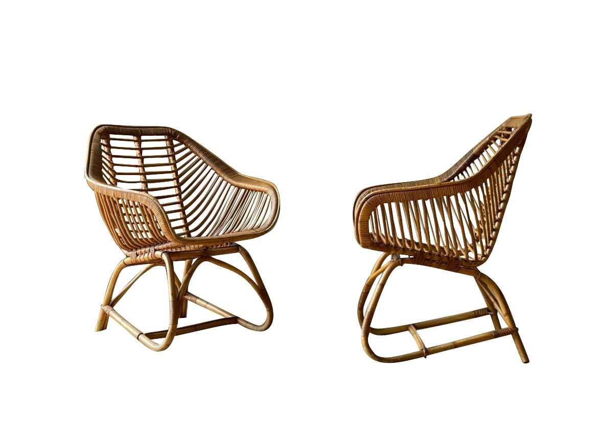Mid-century French pair of very stylish cane and rattan side chairs.
Arriving August.