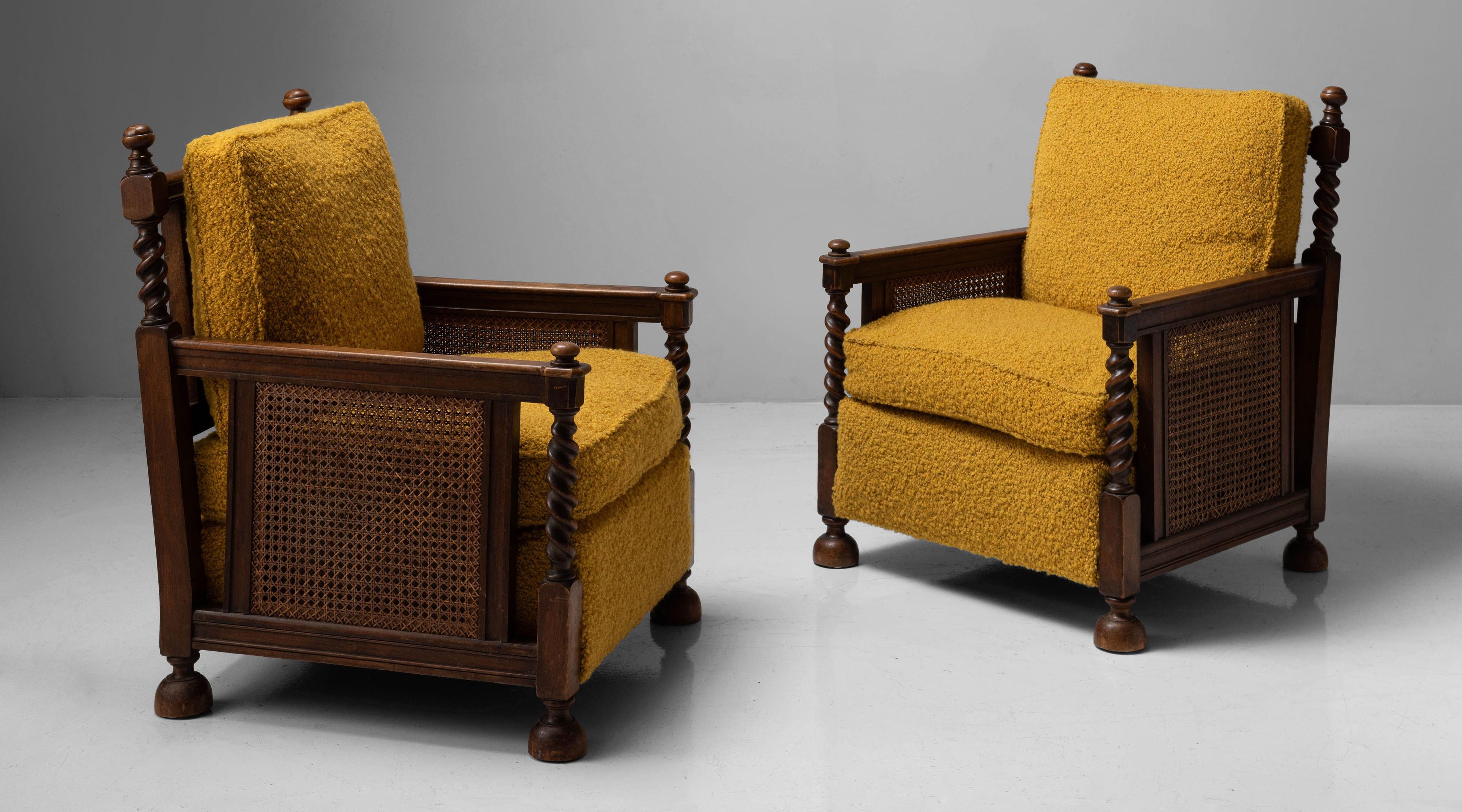 Newly upholstered cushions, oak and hardwood frame with spiral carving and cane sides and back.


Measures: 30