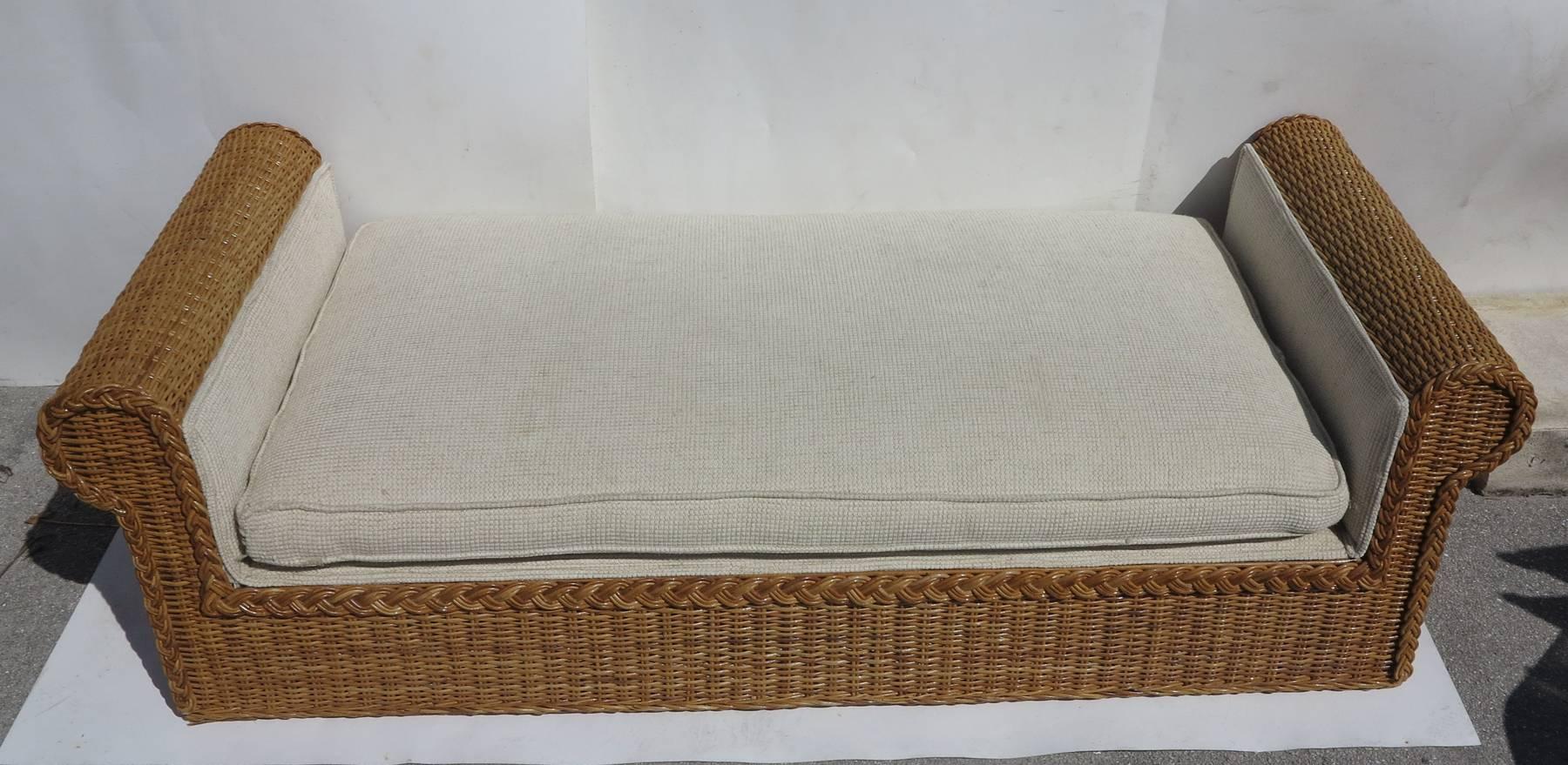 Nice large size daybed made in the Philippines for Rattan works of Atlanta Georgia   a mahogany frame with wicker and woven cane. Original upholstery shows very little use comes with four 22 by 22 inch throw pillows.   .