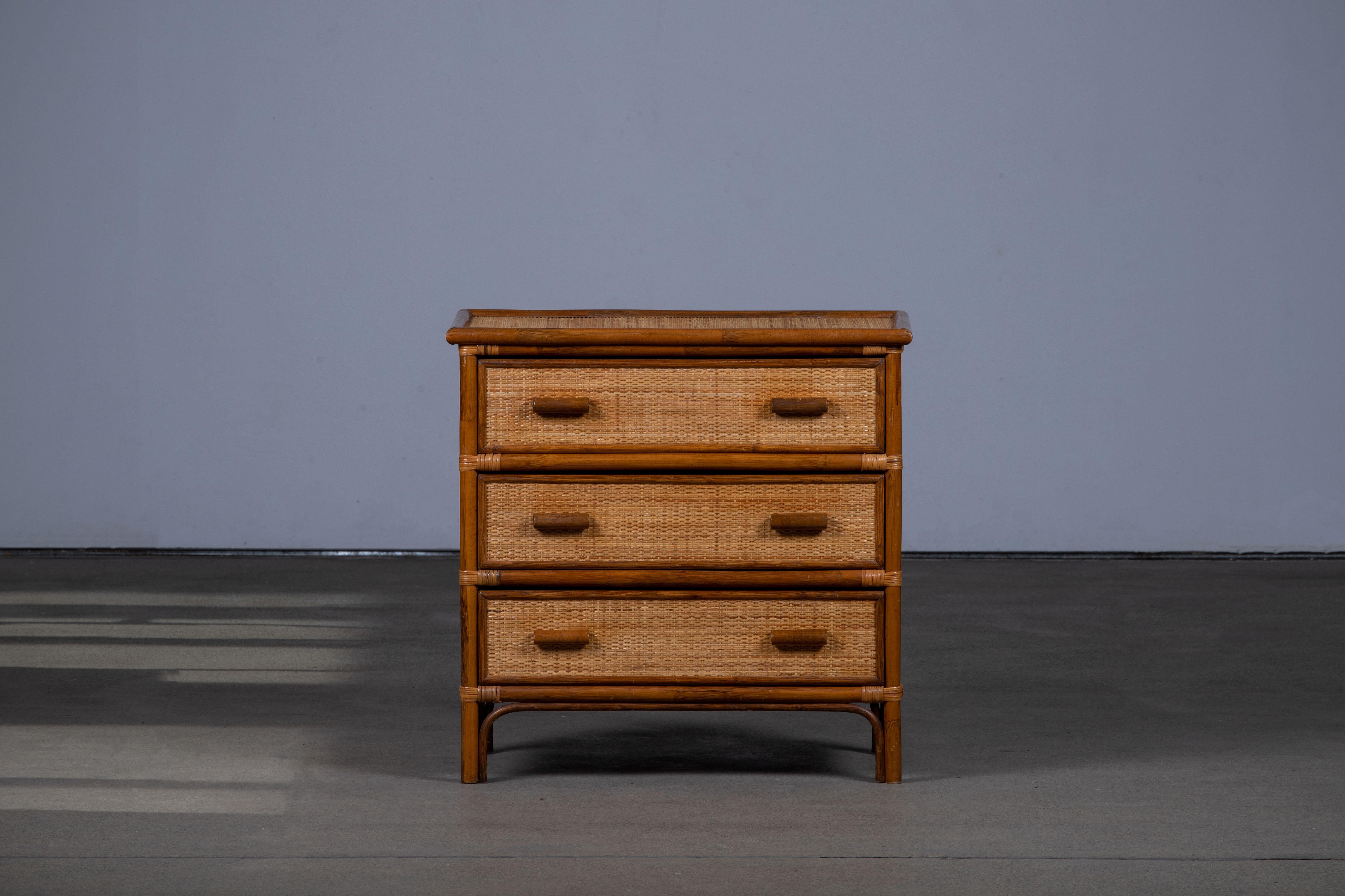 Amazing midcentury bamboo, Rattan and wicker desk with drawers. This wonderful piece was designed in Italy during the 1970s.

This writing table is unique because of the materials used, bamboo and rattan, and it has three drawers, a large one and