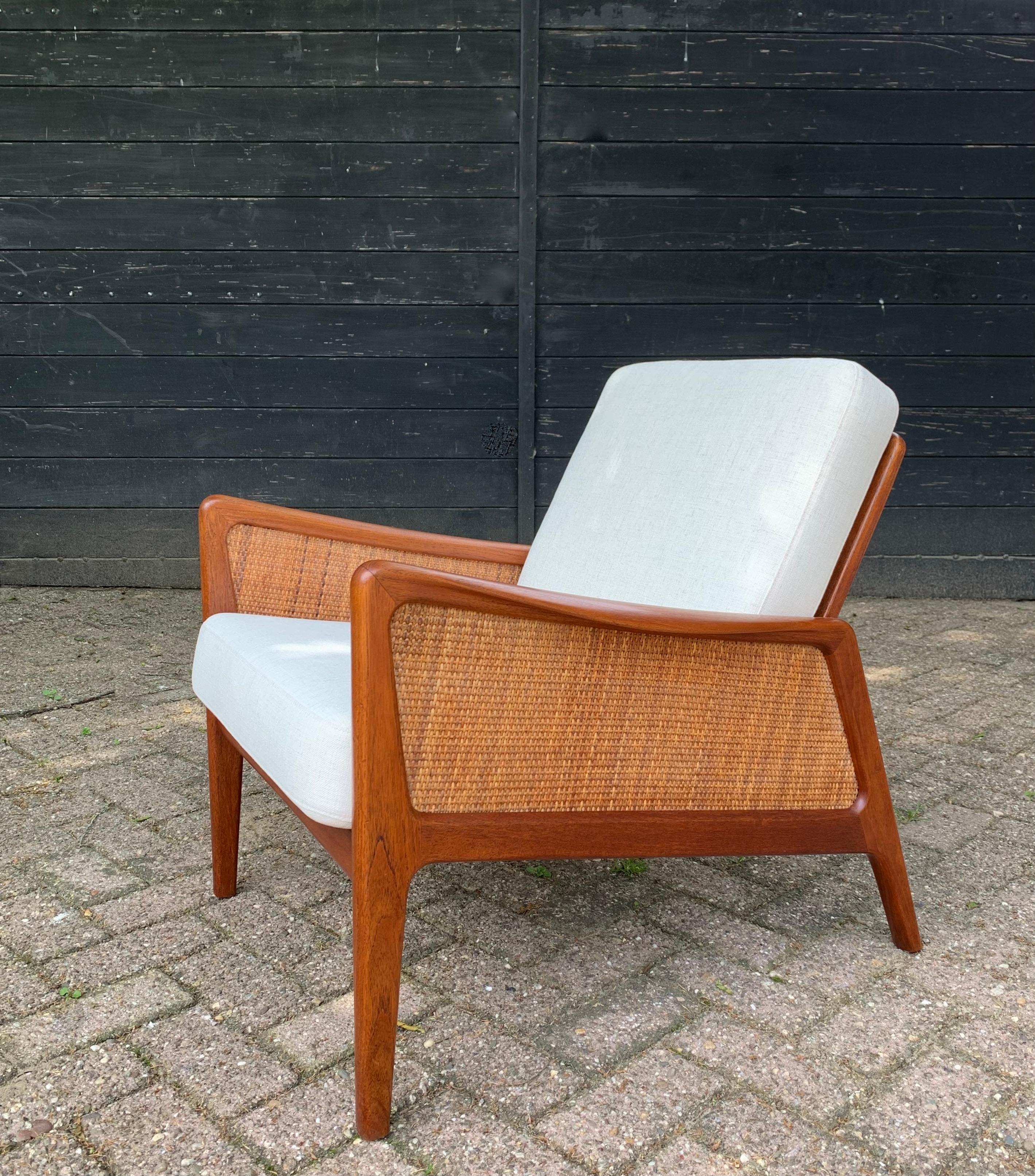 Scandinavian Modern Cane & Teak Lounge Chair Peter Hvidt & Orla Molgaard-Nielsen France & Daverkosen For Sale