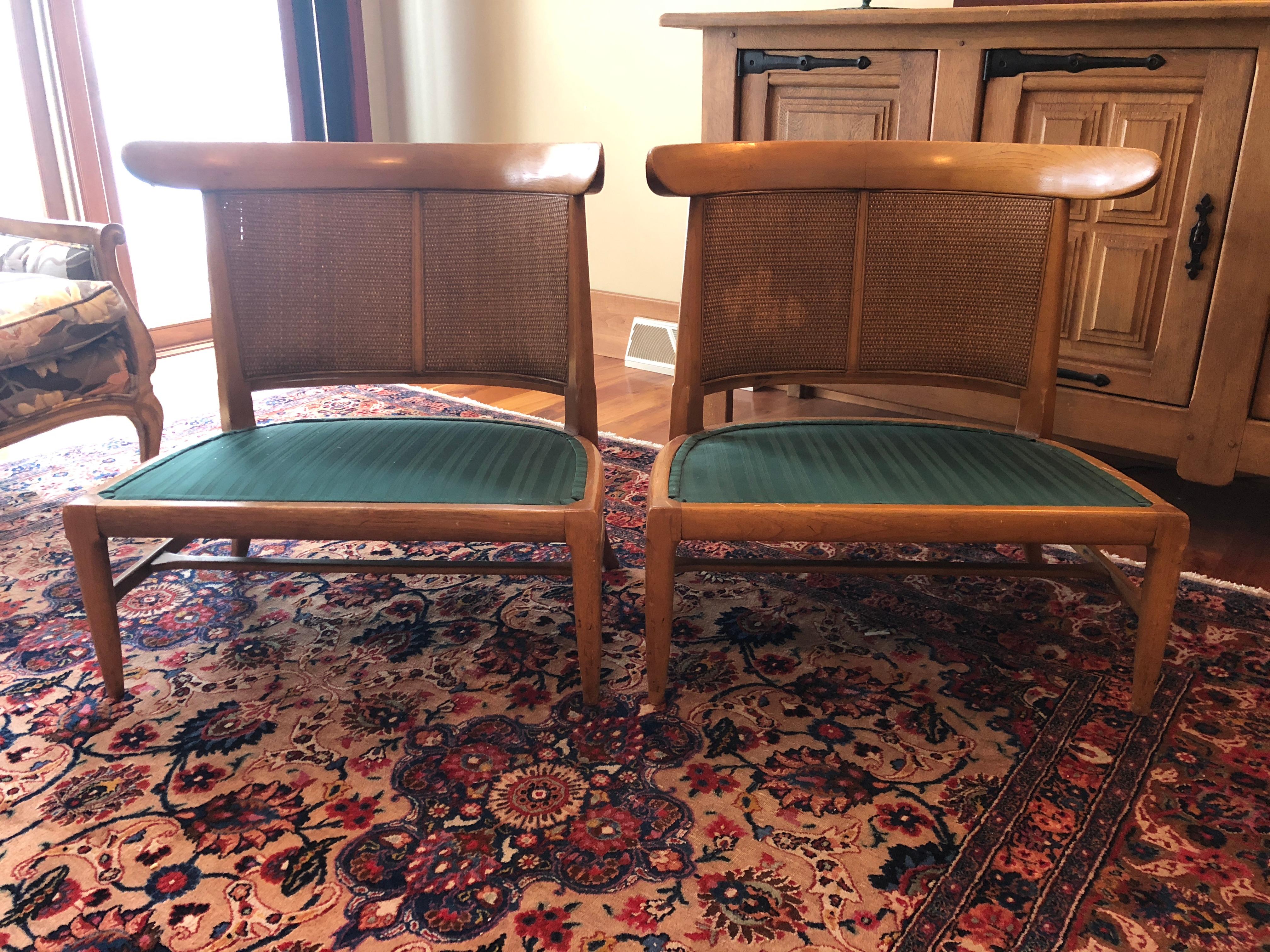A stunning pair of Tomlinson chairs in good condition. Some wear to the wood and refinishing required.

Cushions are not included.
