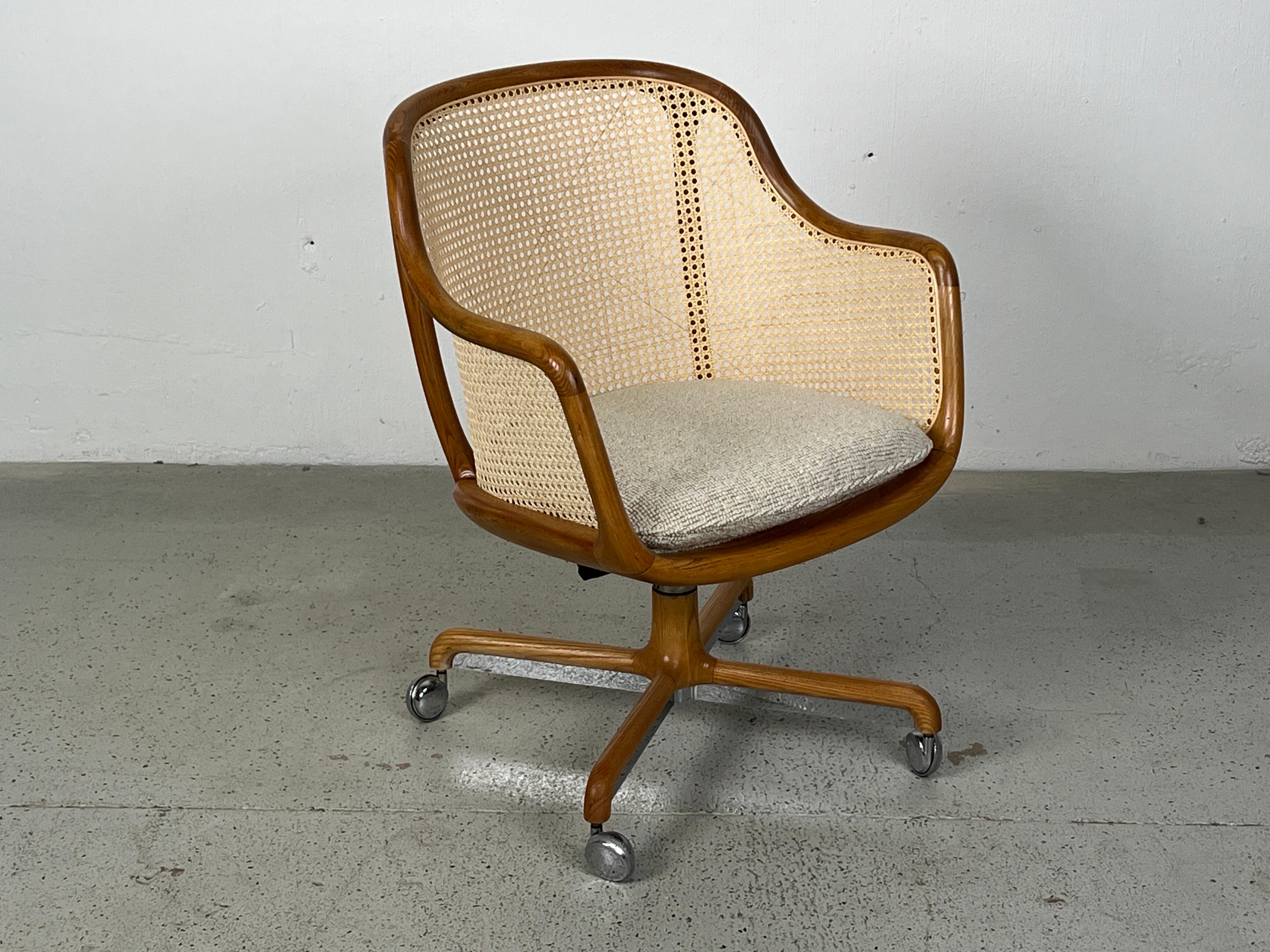 A fully caned tilt / swivel desk chair designed by Ward Bennett for Brickel.