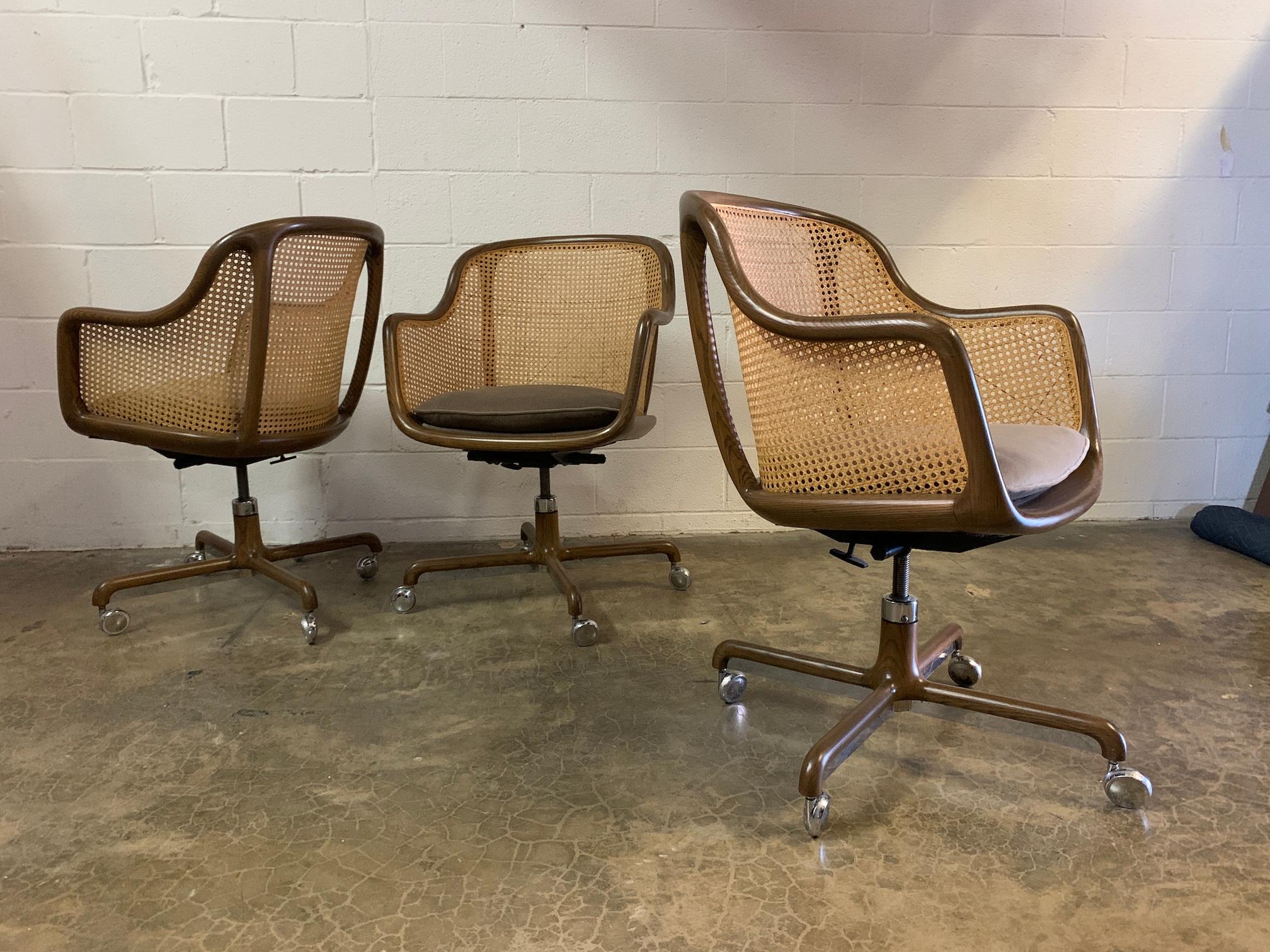 A fully caned tilt / swivel desk chair designed by Ward Bennett for Brickel. Several available.