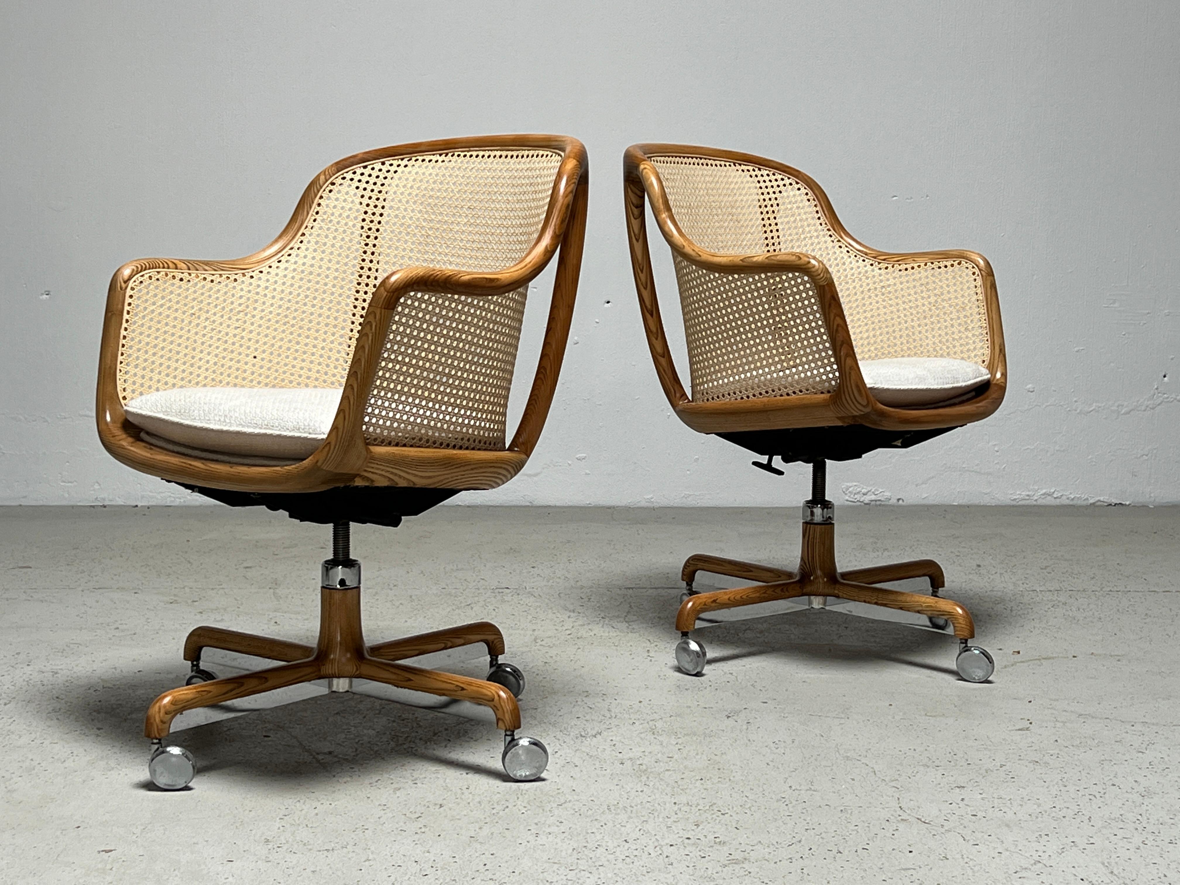 A fully caned tilt / swivel desk chair designed by Ward Bennett for Brickel. Several available. Priced individually.