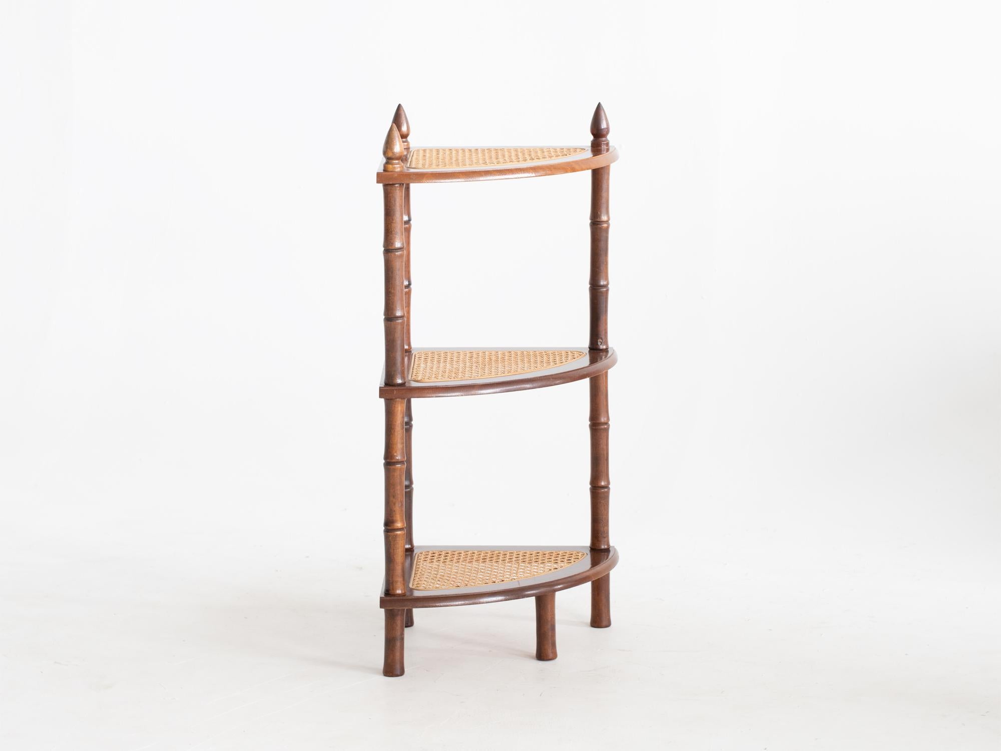 A tiered faux bamboo mahogany etagere with caned panels. English, mid-late 20C.

Stock ref. #2392

In good sturdy order with light cosmetic wear.

77 x 33.5 x 33.5 cm

30.3 x 13.2 x 13.2 