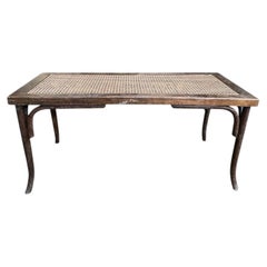 Caned piano bench
