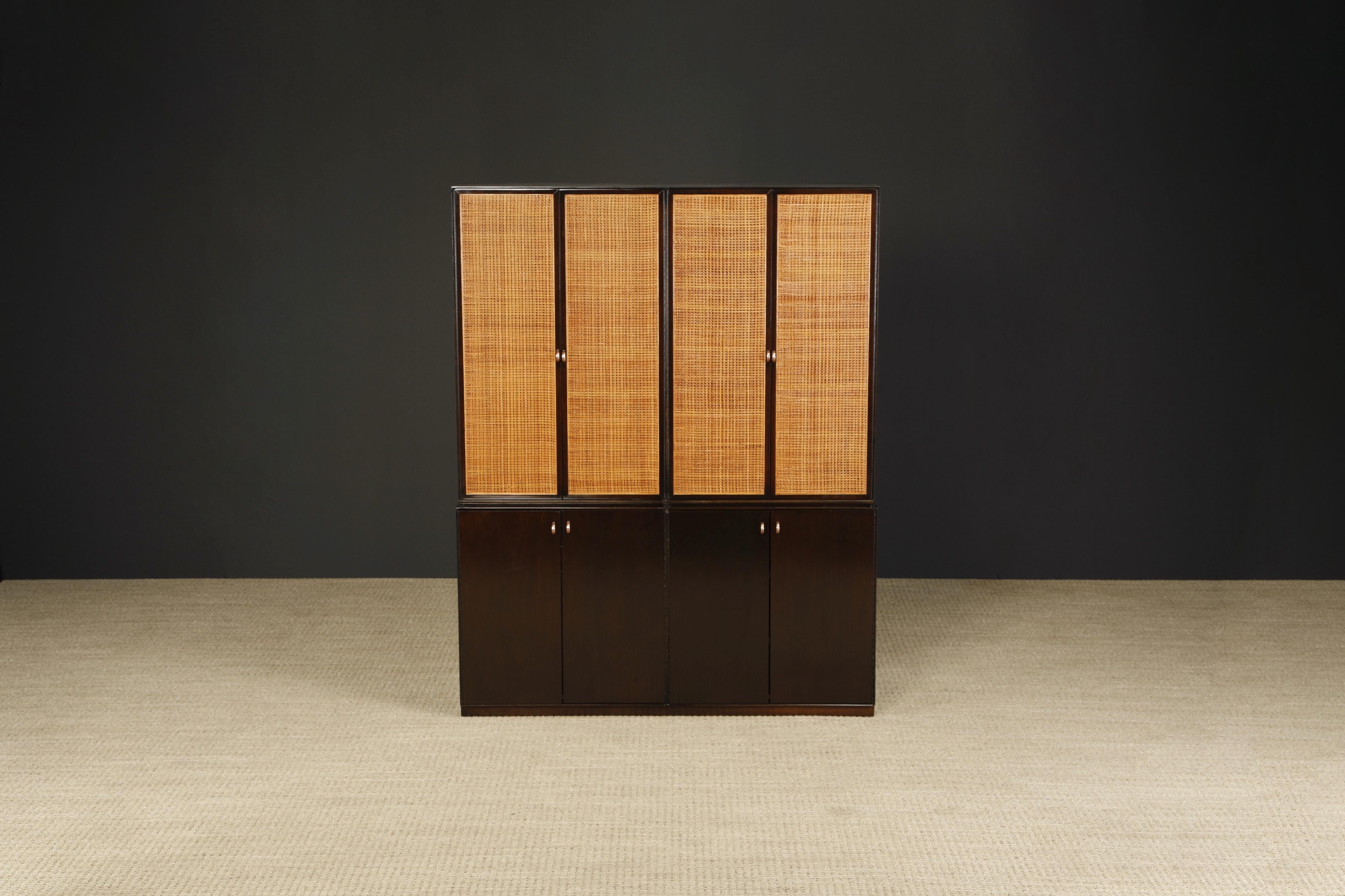 This beautifully refinished cabinet with hutch was designed by Paul Mccobb for Directional Furniture and part of their 'Custom Collection' line produced in circa late 1950s and features gorgeous caned doors and brass handles. Signed with