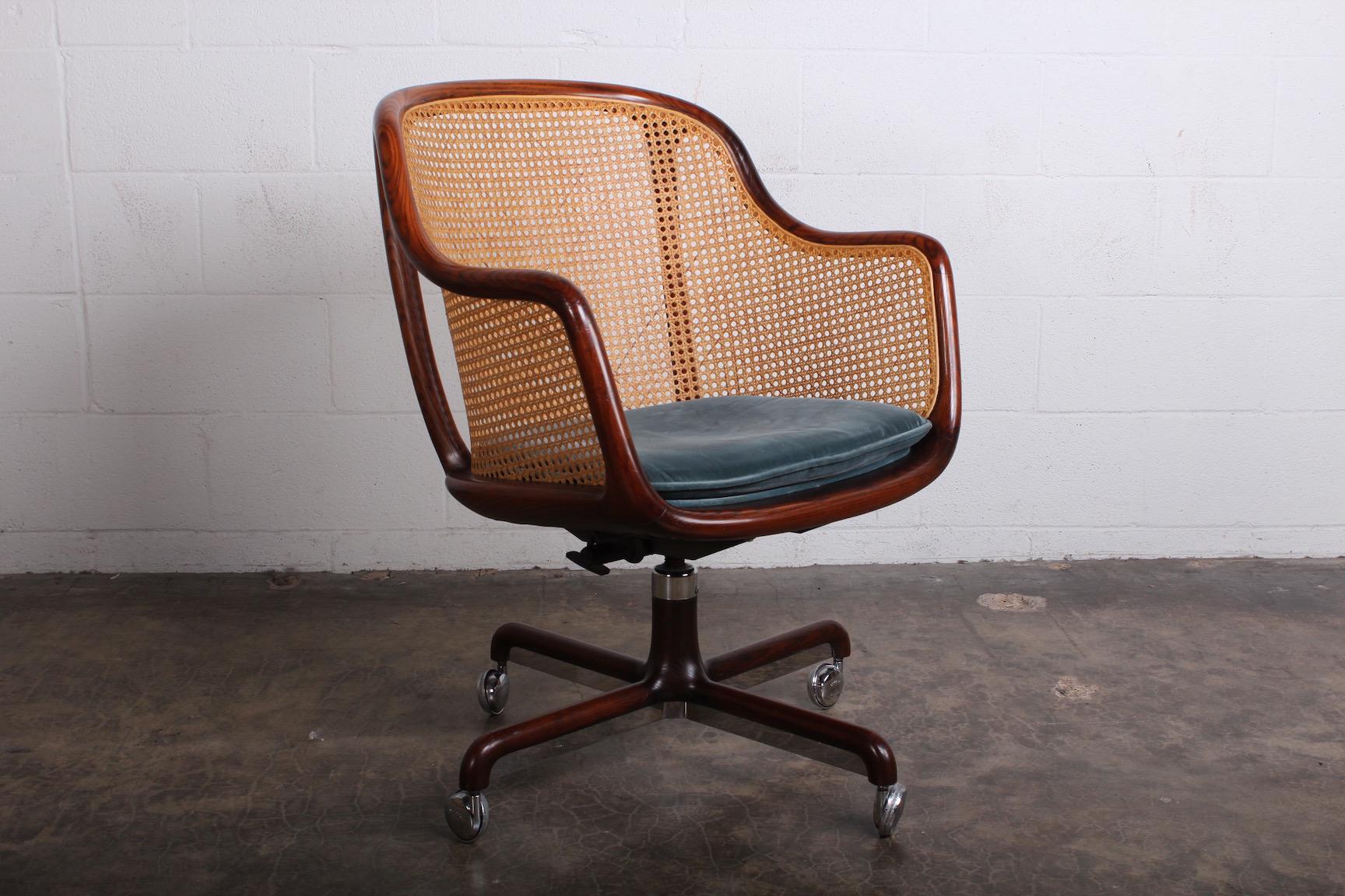 A fully caned desk chair with ash frame and original velvet seat. Designed by Ward Bennett for Brickel.
Height is adjustable.