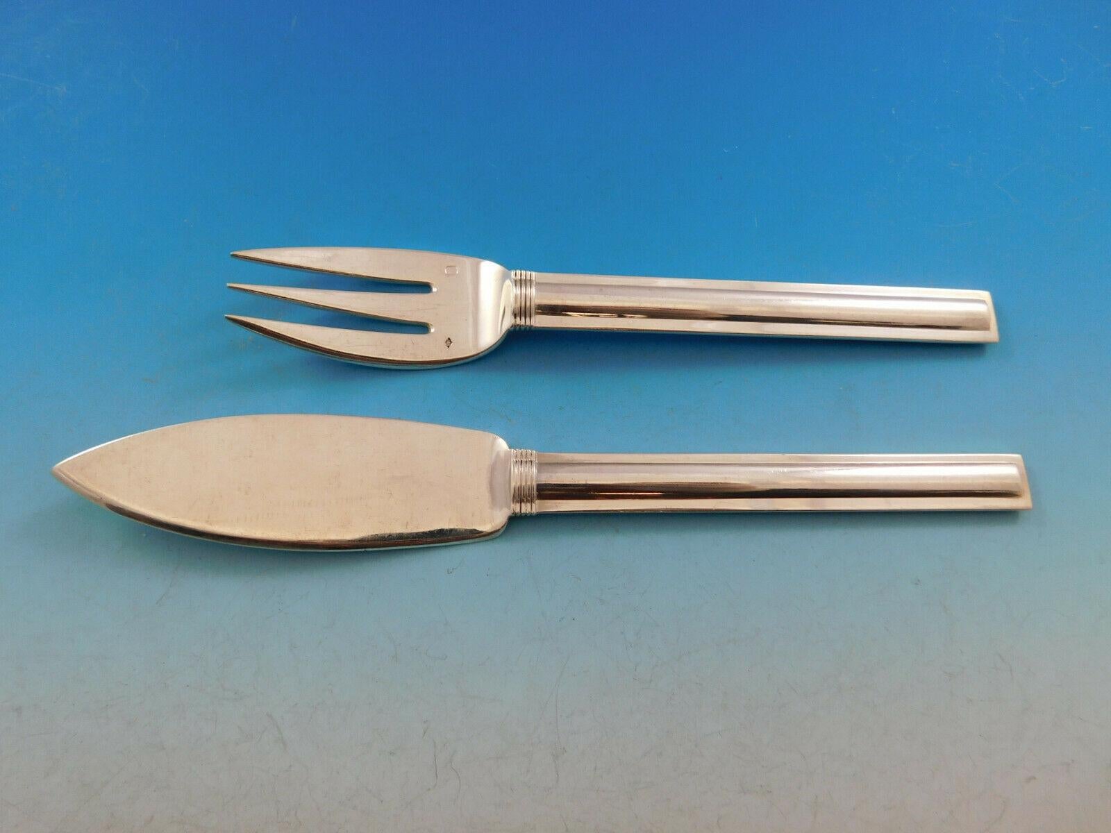 Cannes by Puiforcat France sterling silver flatware. This 2-piece set includes:

 1 individual fish knife, 8