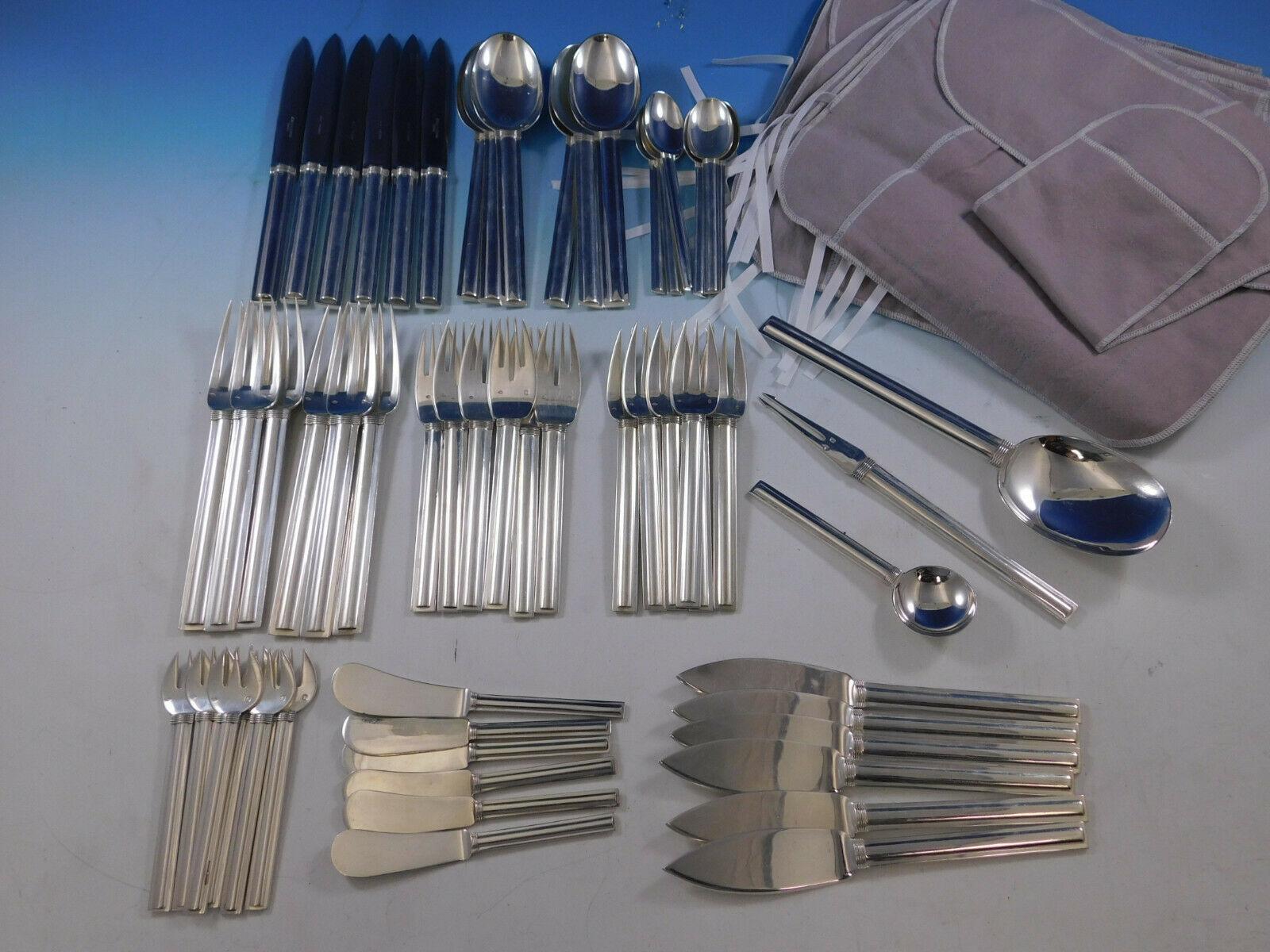 Superb Cannes by Puiforcat France sterling silver flatware set - 74 pieces. This set includes:

8 dinner knives, 9 1/8