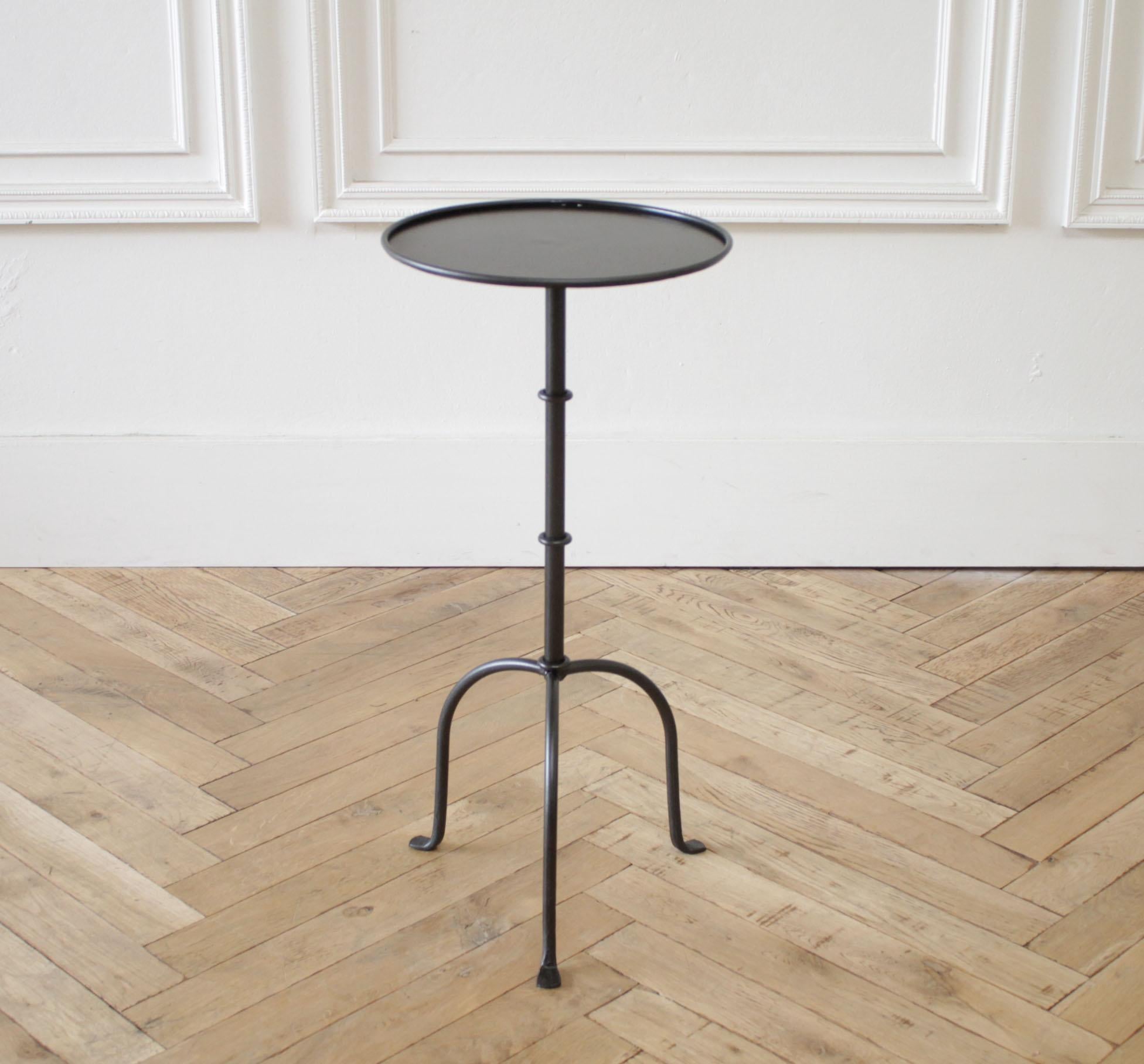 Cannes tall iron drink table in iron finish or brass finish
Inspired by the antique version, this tall drink table is forged iron with a round table top. Offered in either the dark iron finish, or antique brass colored finish.
Made in the USA,