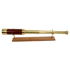 Round section brass telescope with mahogany wood handle 1850s